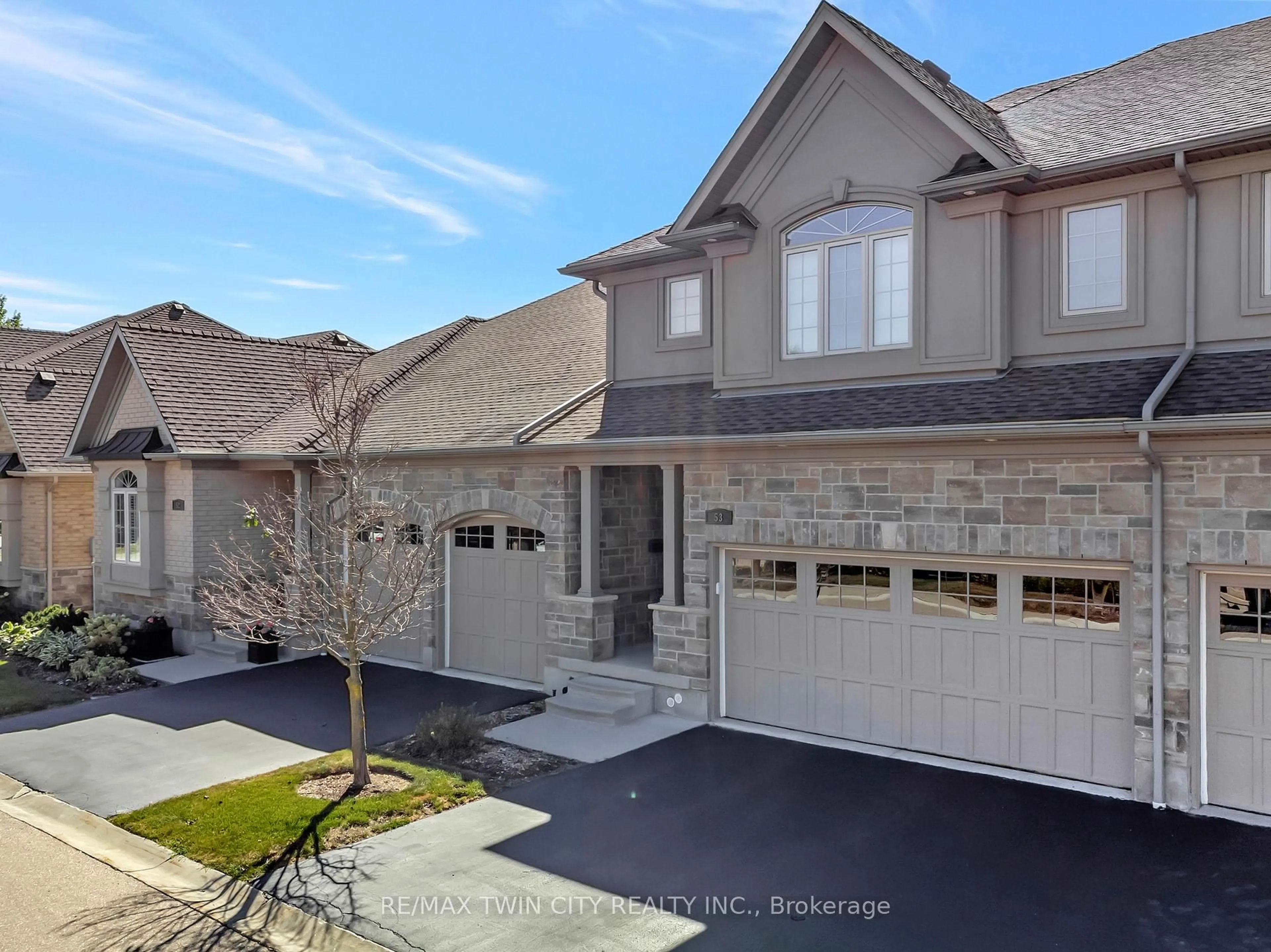 Home with brick exterior material, street for 435 Winchester Dr #53, Waterloo Ontario N2T 0B7