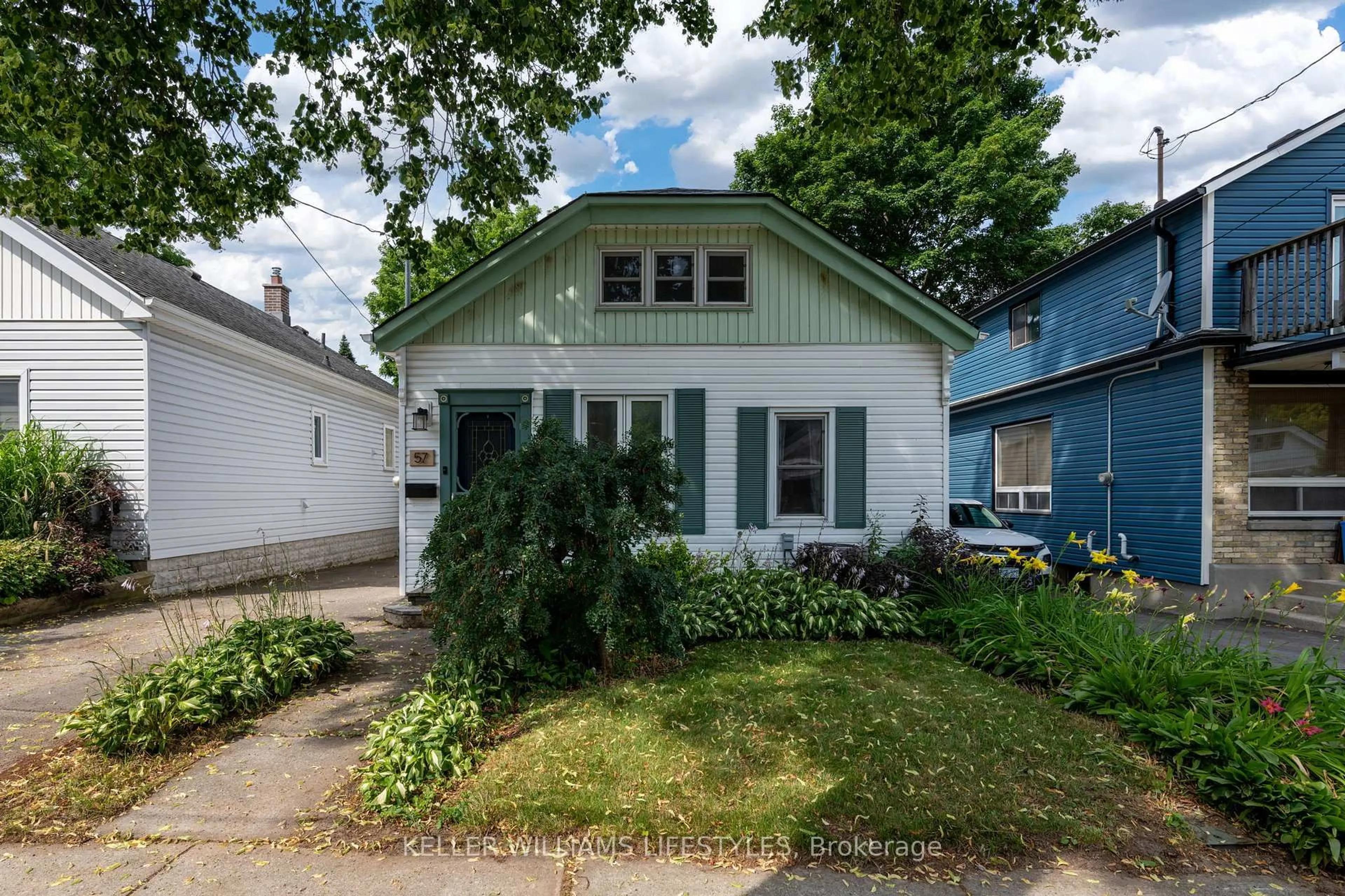 Home with vinyl exterior material, street for 57 Bedford Rd, London East Ontario N5Y 1Z5