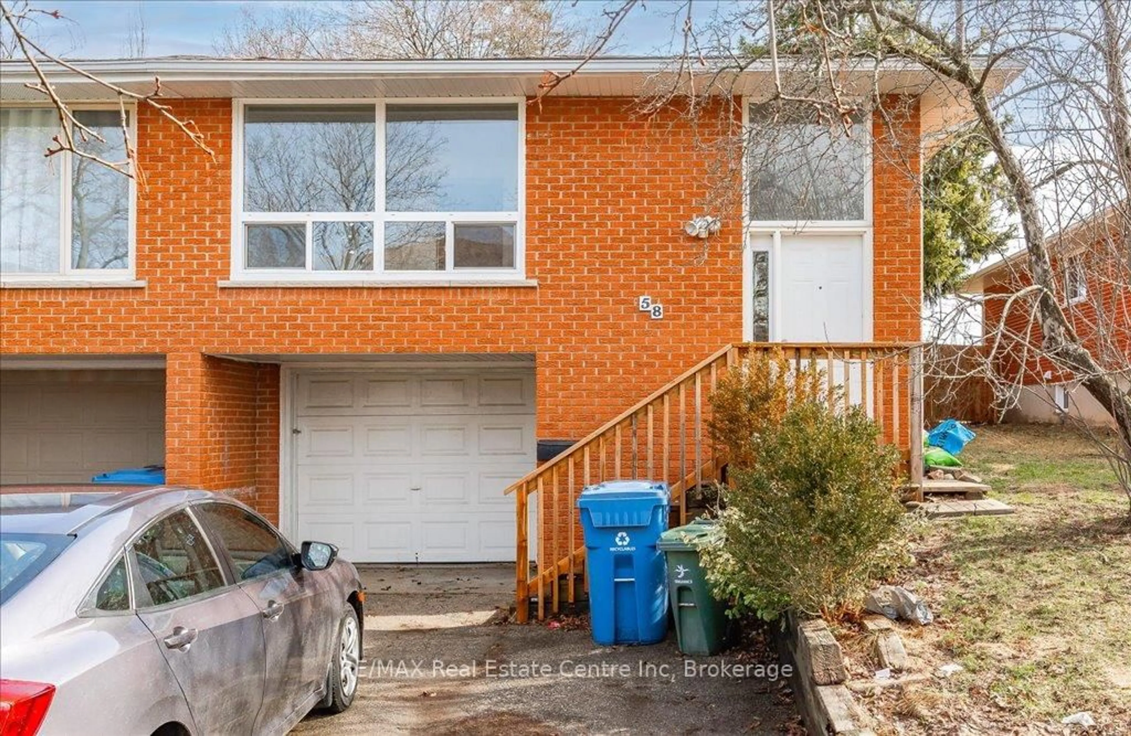 Home with brick exterior material, street for 58 Conroy Cres, Guelph Ontario N1G 2V6
