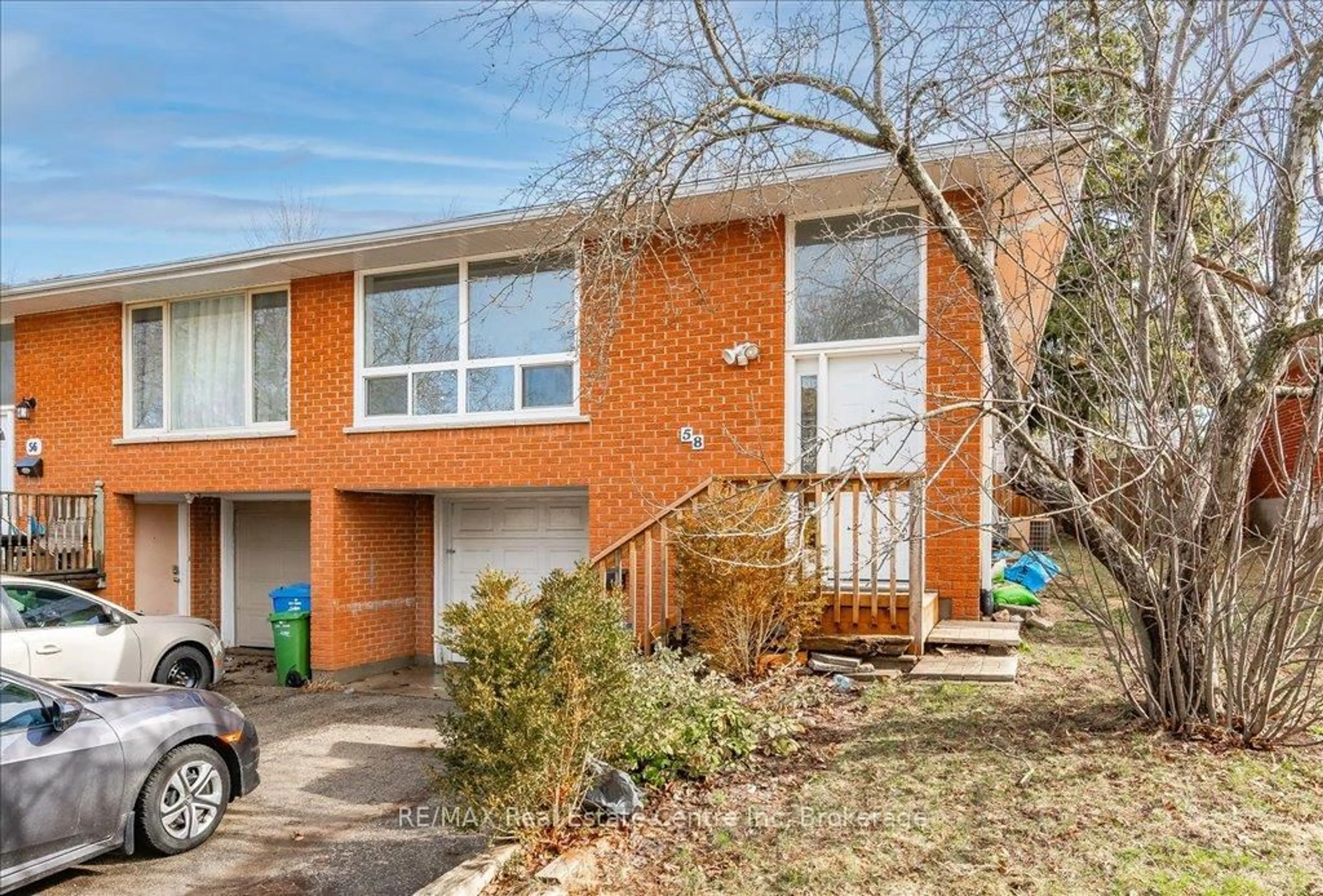 Home with brick exterior material, street for 58 Conroy Cres, Guelph Ontario N1G 2V6