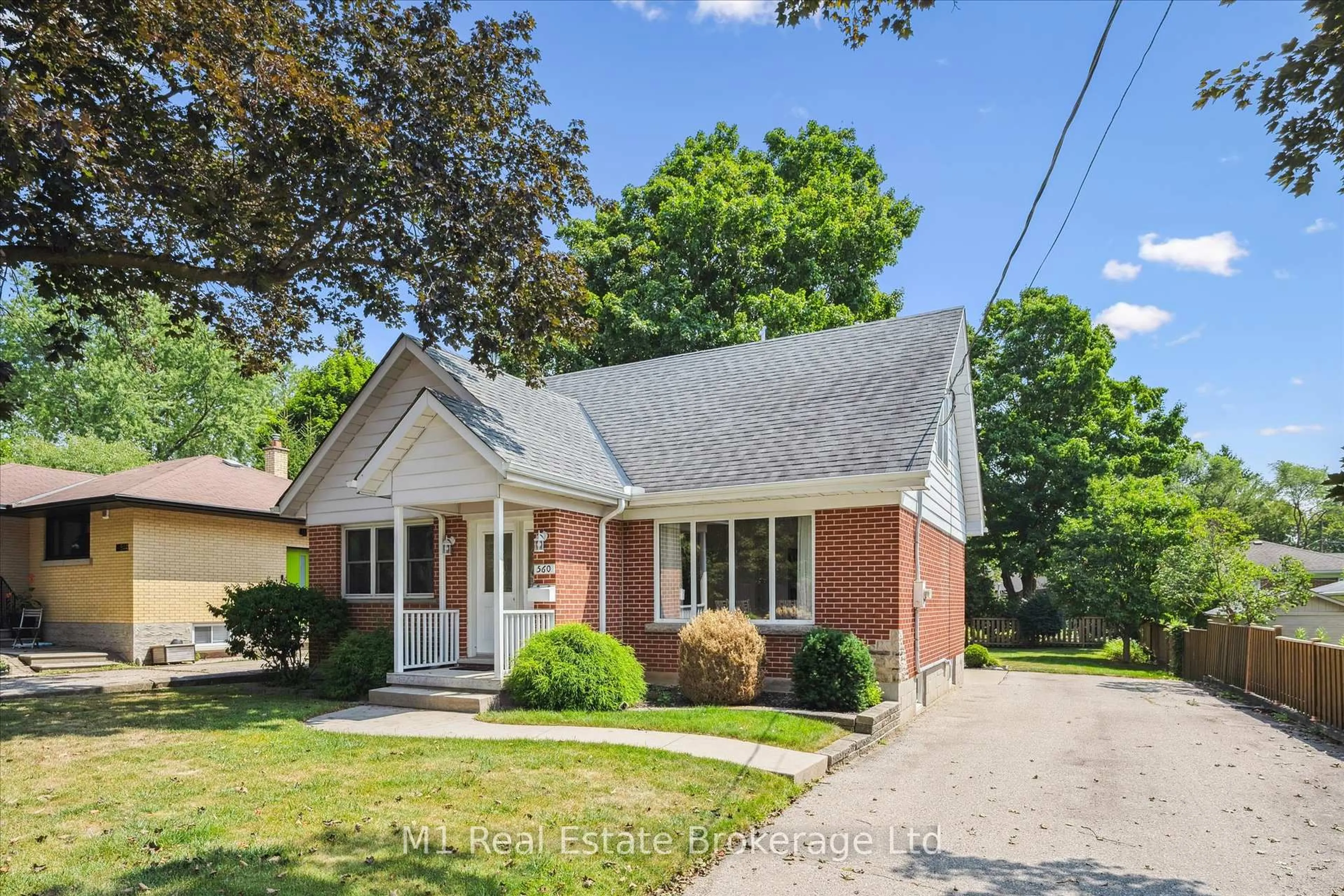 Home with brick exterior material, street for 560 Paisley Rd, Guelph Ontario N1H 2S1