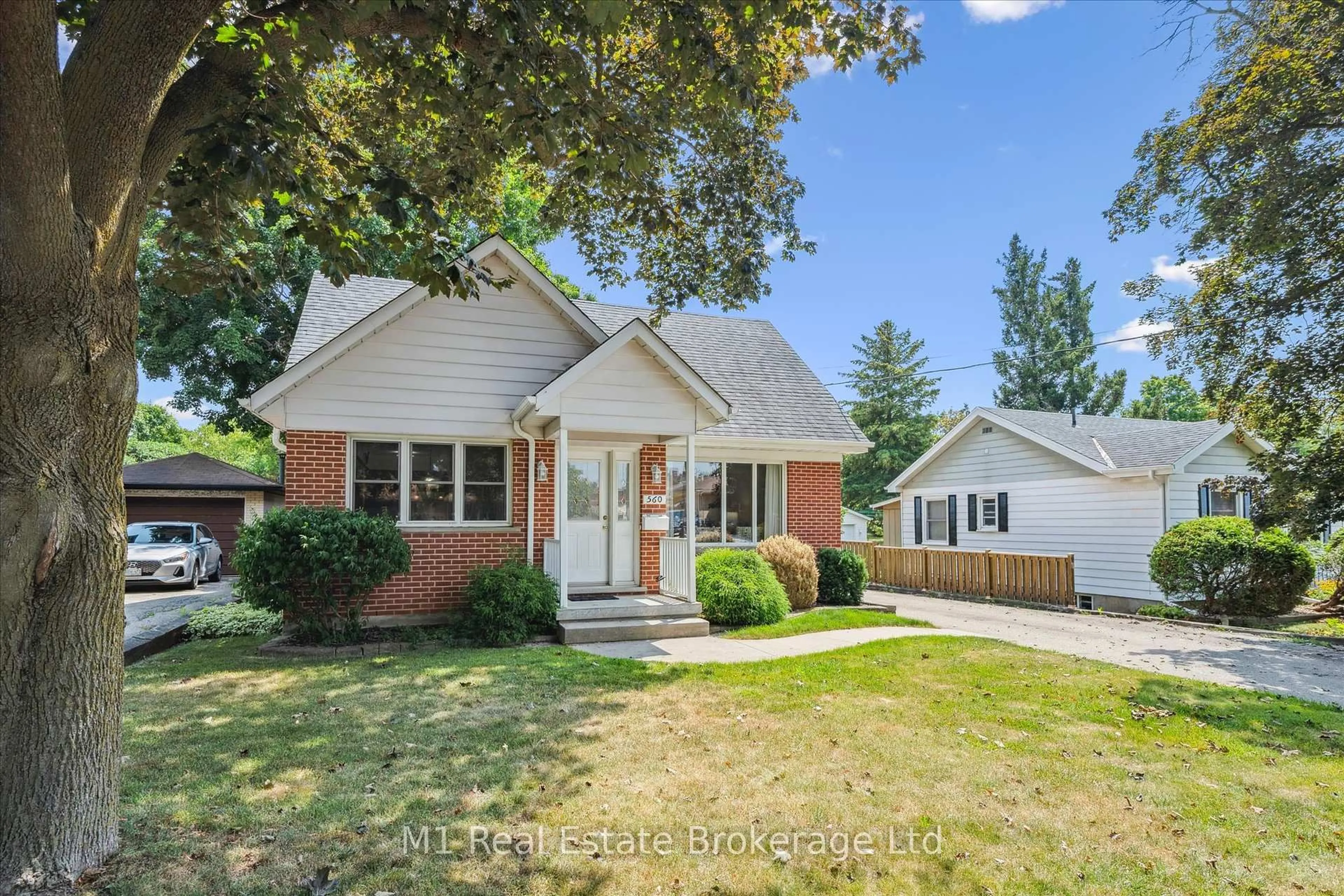 Home with brick exterior material, street for 560 Paisley Rd, Guelph Ontario N1H 2S1