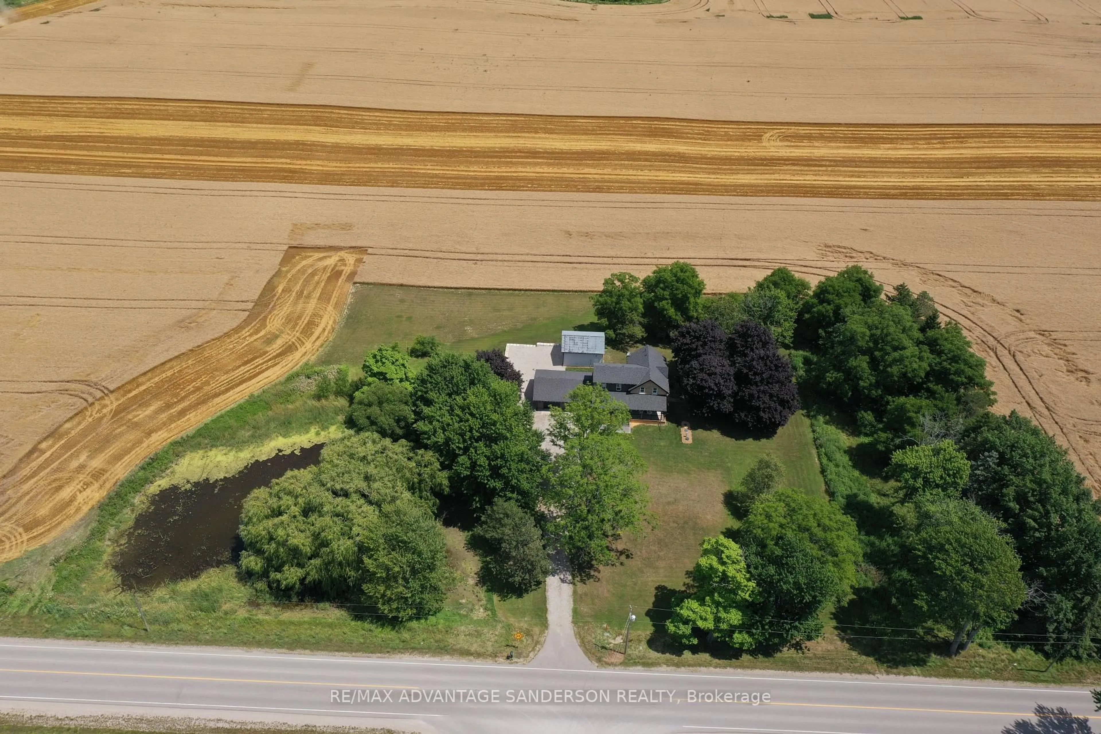 A pic from outside/outdoor area/front of a property/back of a property/a pic from drone, unknown for 22524 Vanneck Rd, Middlesex Centre Ontario N0M 2A0