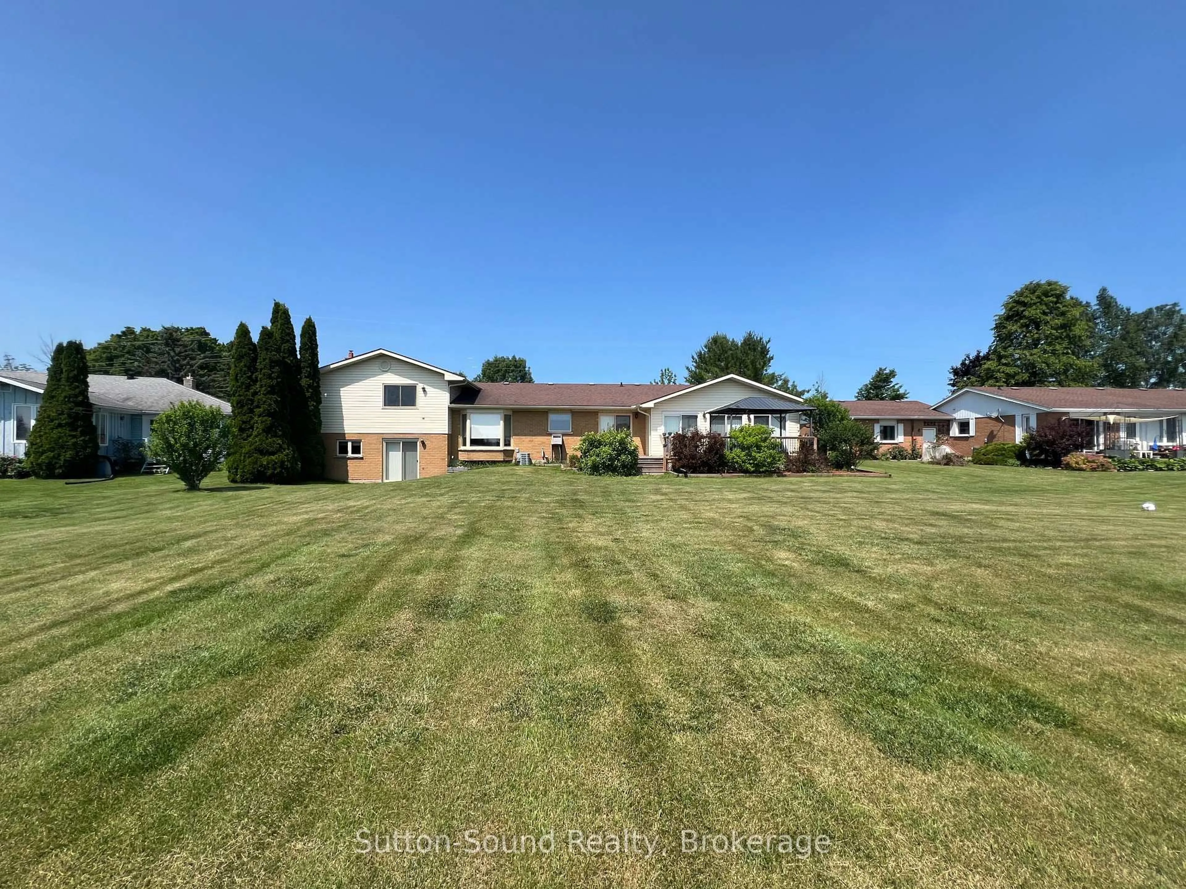 A pic from outside/outdoor area/front of a property/back of a property/a pic from drone, water/lake/river/ocean view for 178463 Grey Rd 17 Rd, Georgian Bluffs Ontario N4K 5N4