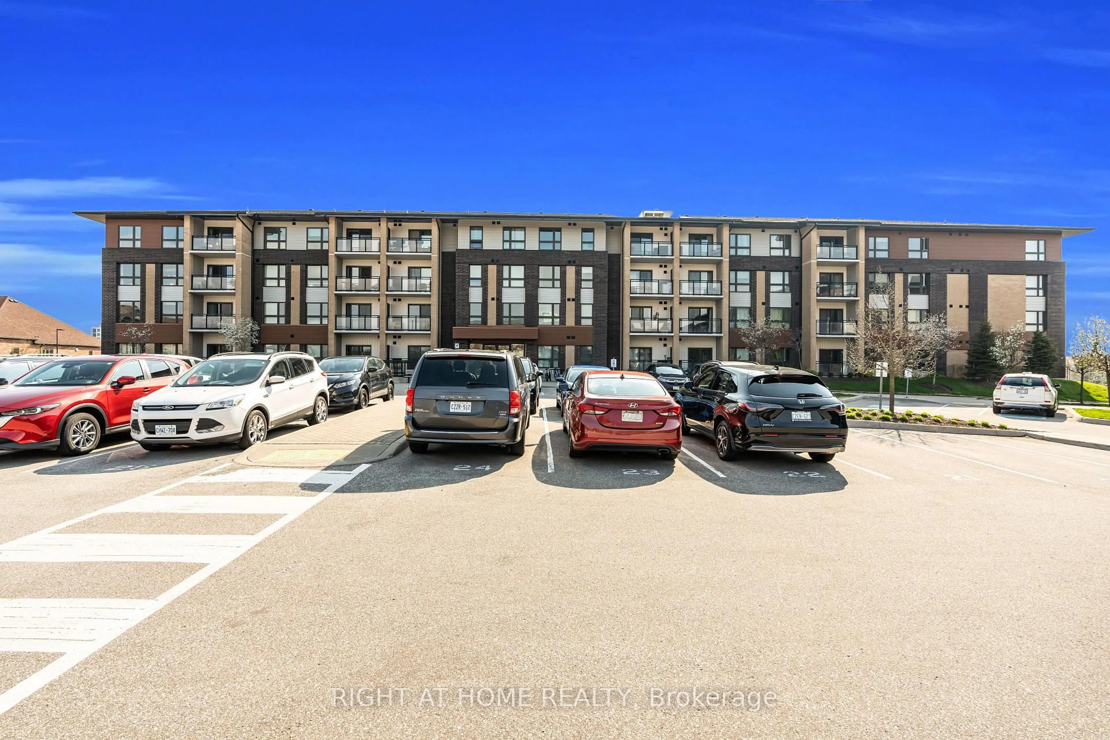 A pic from outside/outdoor area/front of a property/back of a property/a pic from drone, street for 25 Kay Cres #LL12, Guelph Ontario N1L 0P2