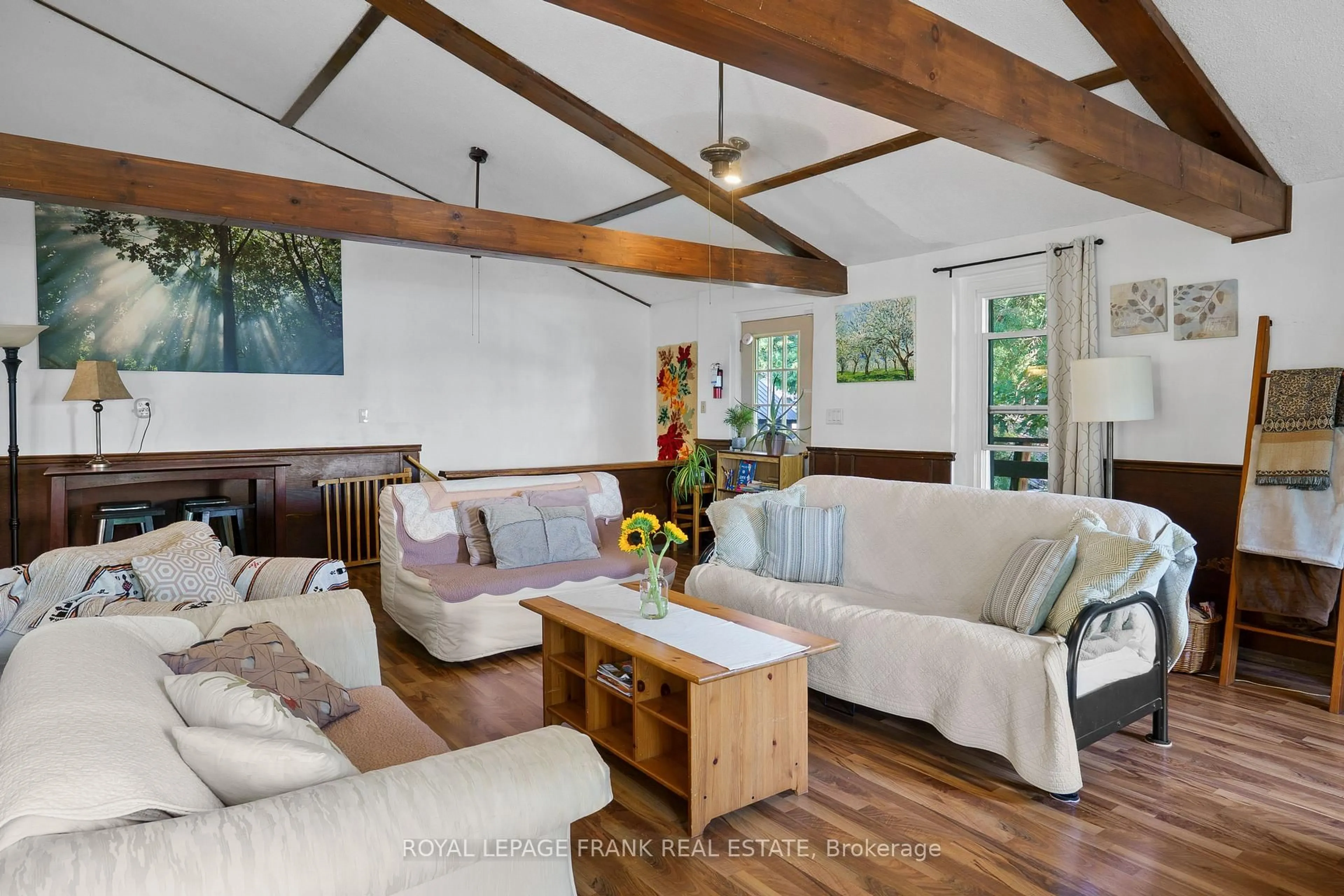 Living room with furniture, wood/laminate floor for 230-232 Lake Dalrymple Rd, Kawartha Lakes Ontario L0K 1W0