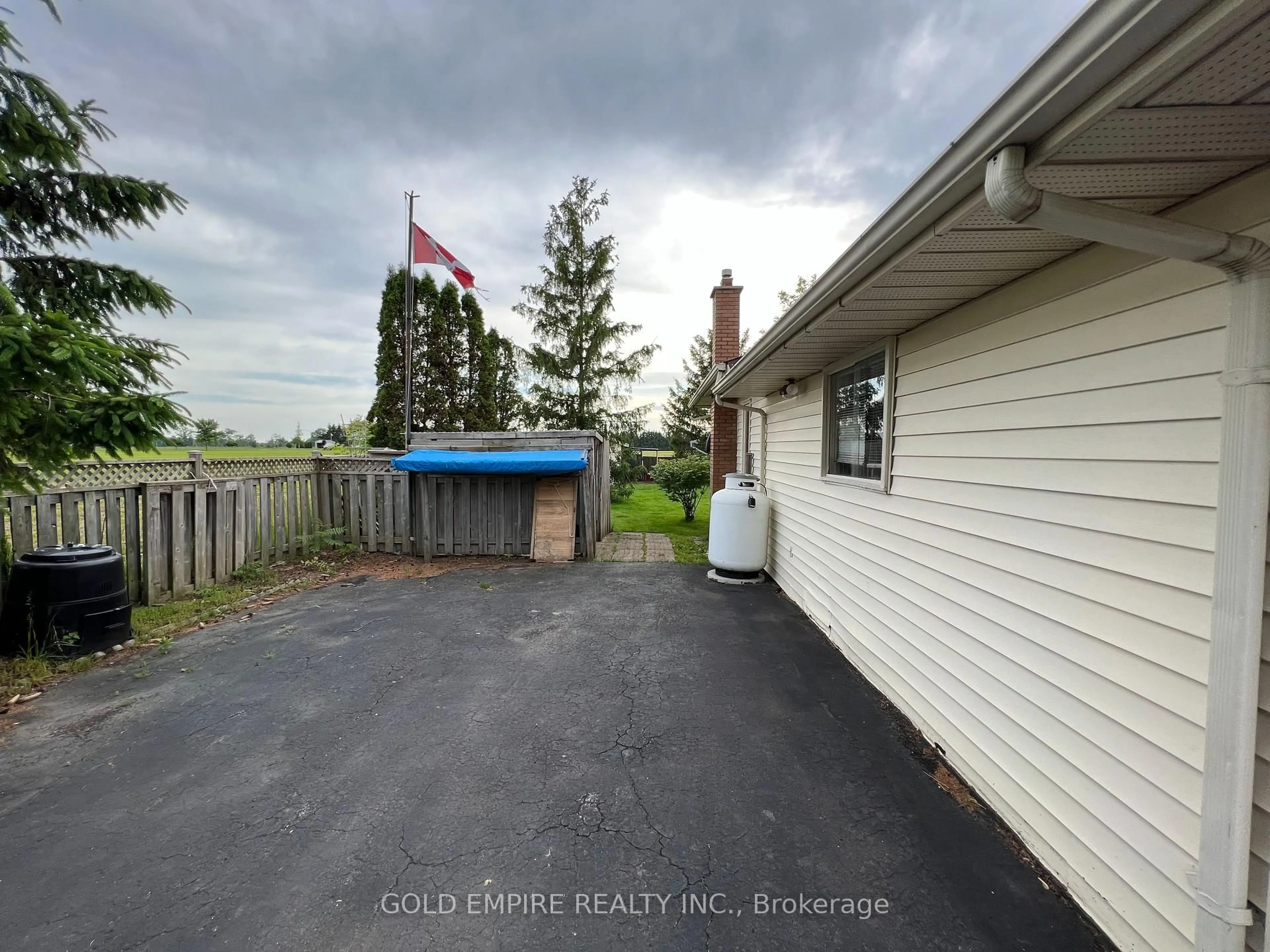 A pic from outside/outdoor area/front of a property/back of a property/a pic from drone, unknown for 11635 Sunset Rd, Southwold Ontario N5P 3T2