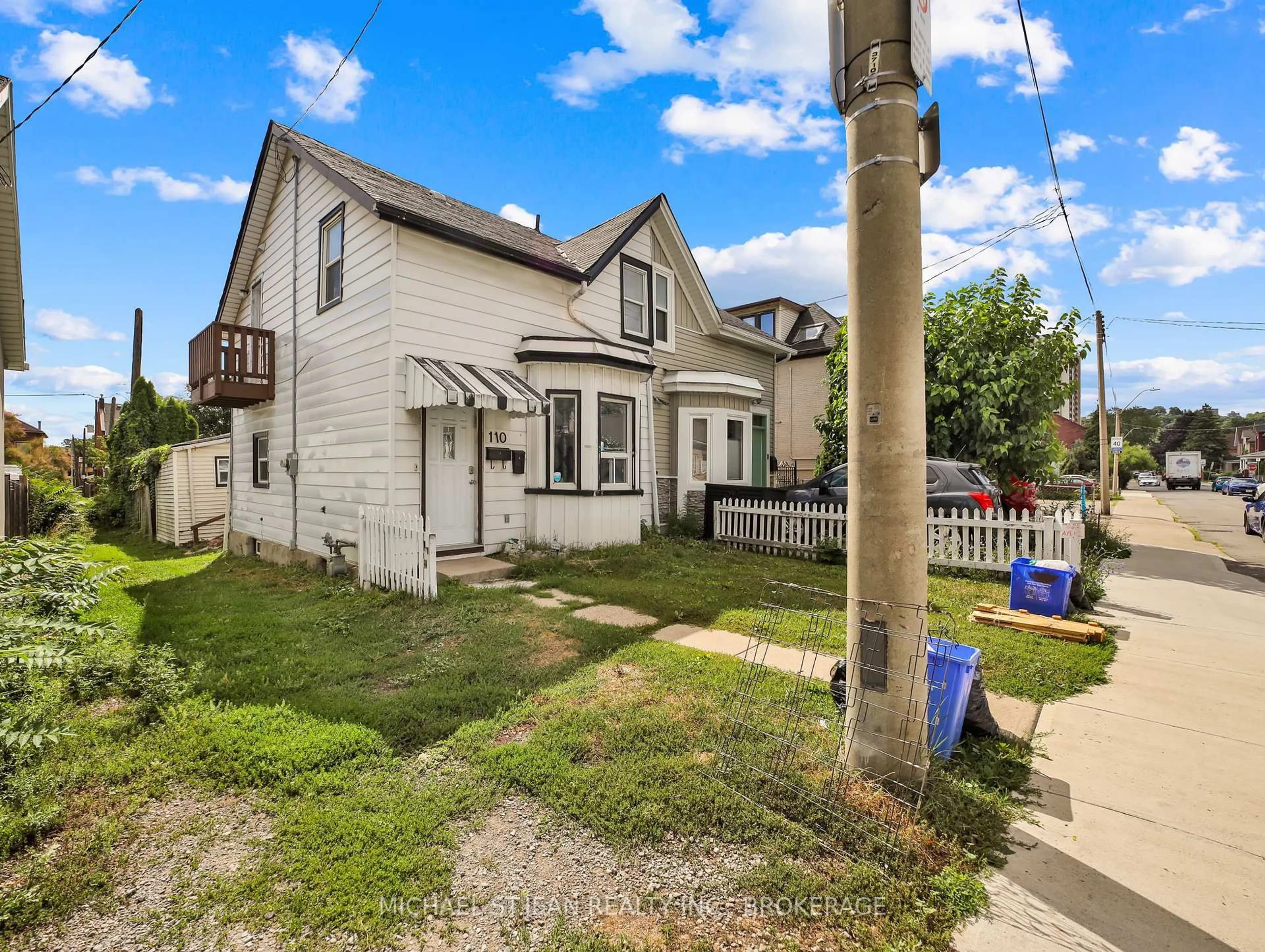 A pic from outside/outdoor area/front of a property/back of a property/a pic from drone, street for 110 Emerald St, Hamilton Ontario L8L 5K4