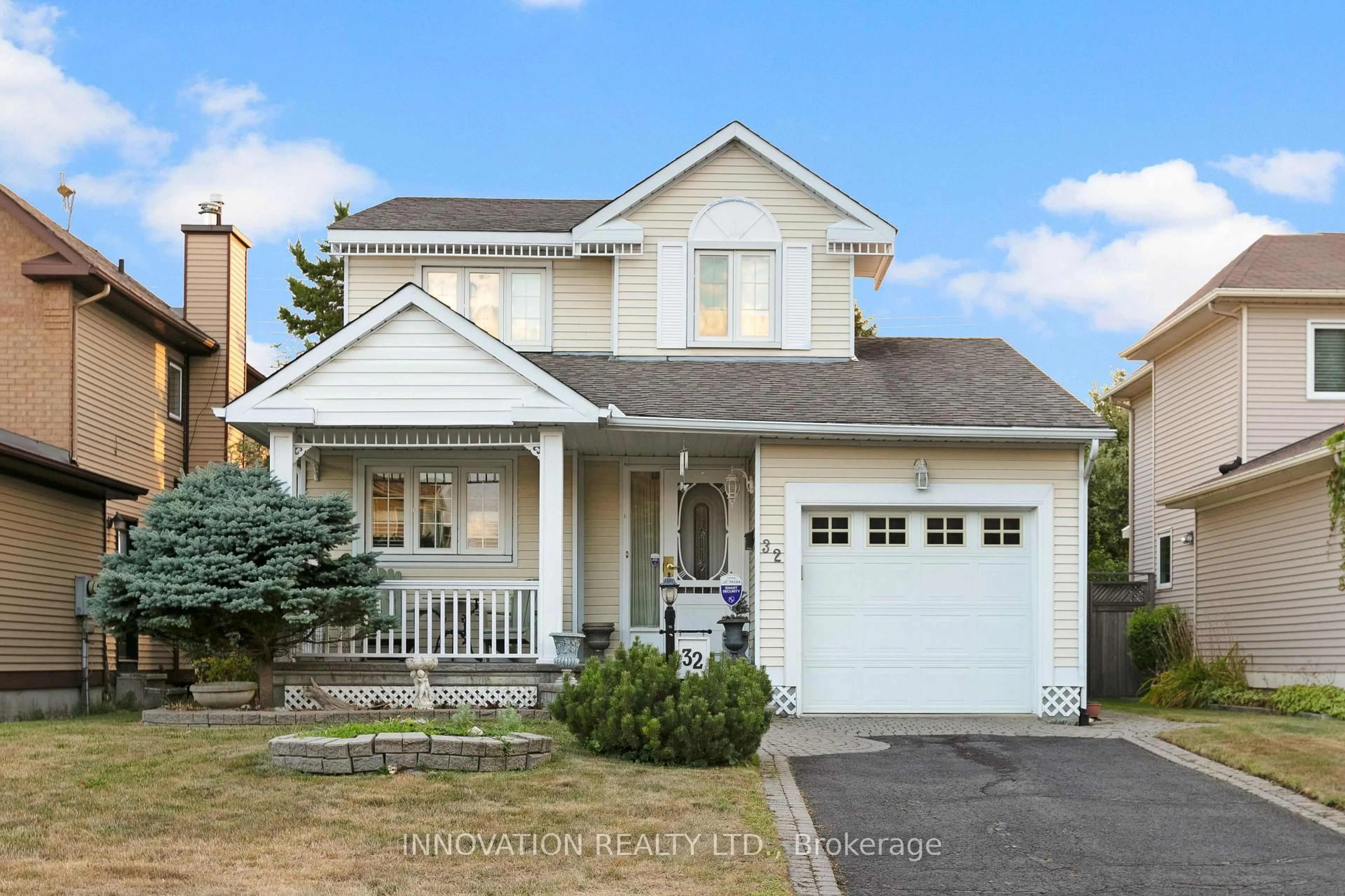 Home with vinyl exterior material, street for 32 Framingham Cres, Barrhaven Ontario K2J 3J8
