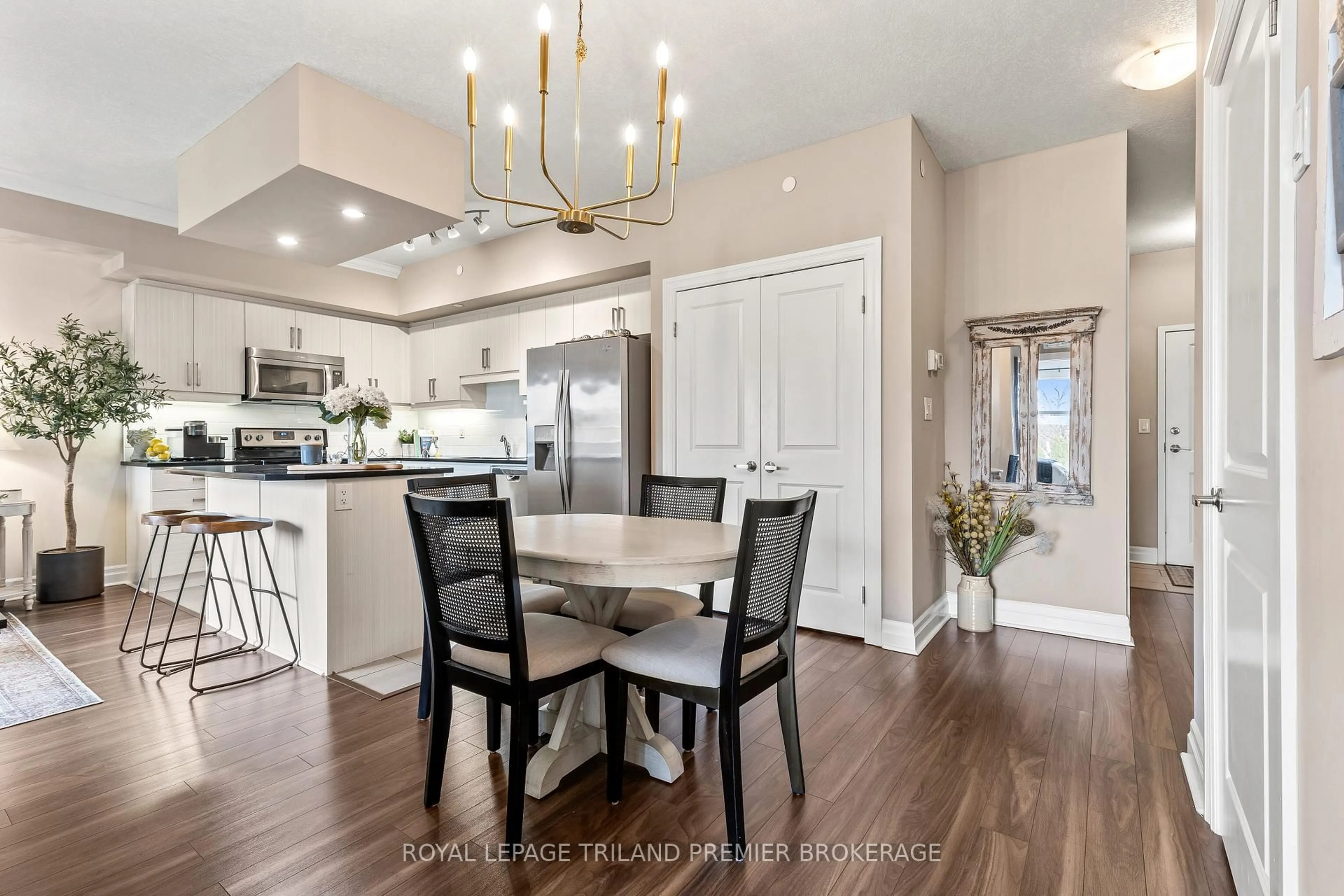 Open concept kitchen, wood/laminate floor for 89 Ridout St #408, London South Ontario N6C 3X2