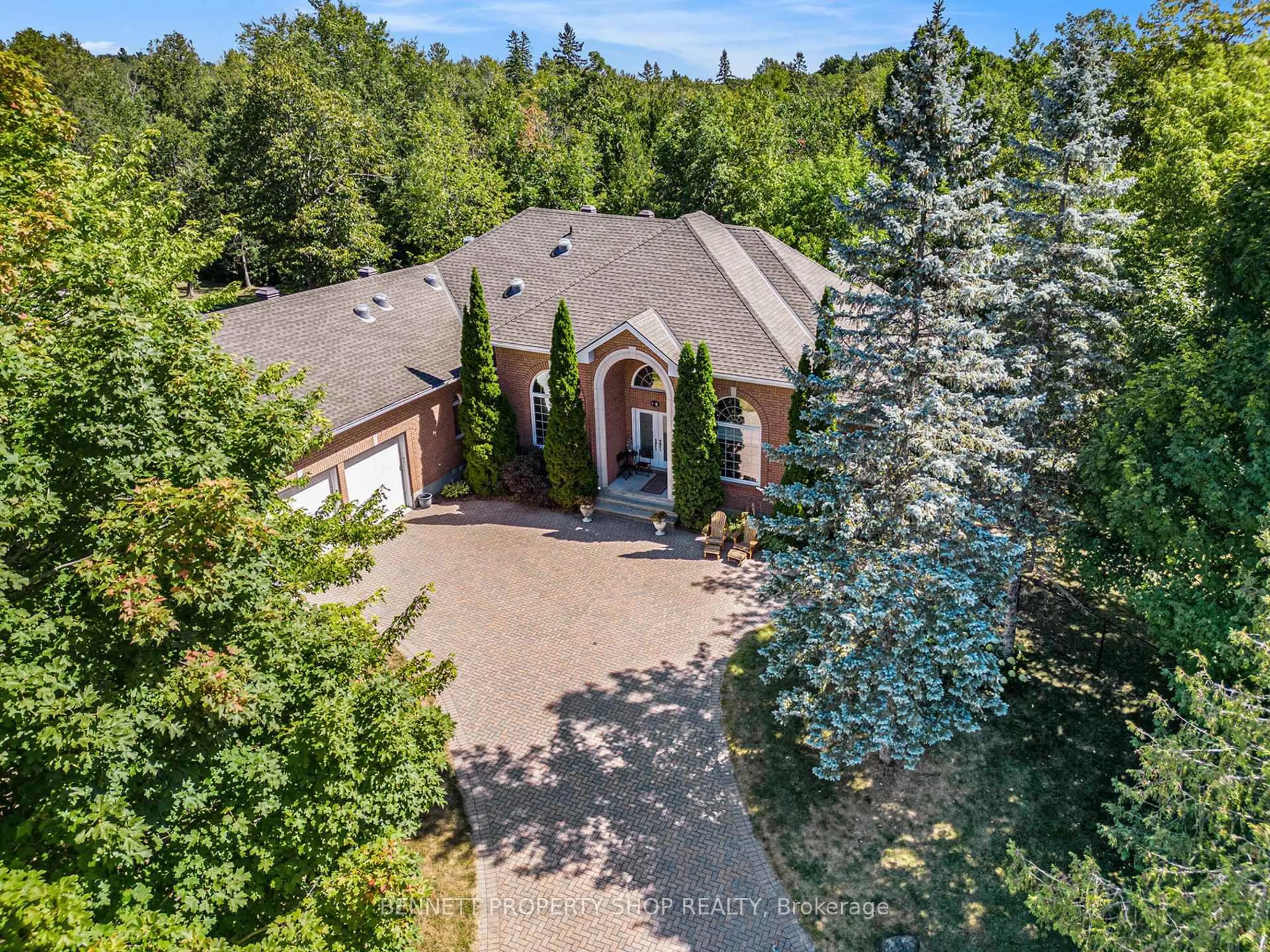 A pic from outside/outdoor area/front of a property/back of a property/a pic from drone, forest/trees view for 5 Countryside Green, Ottawa Ontario K2R 1B5