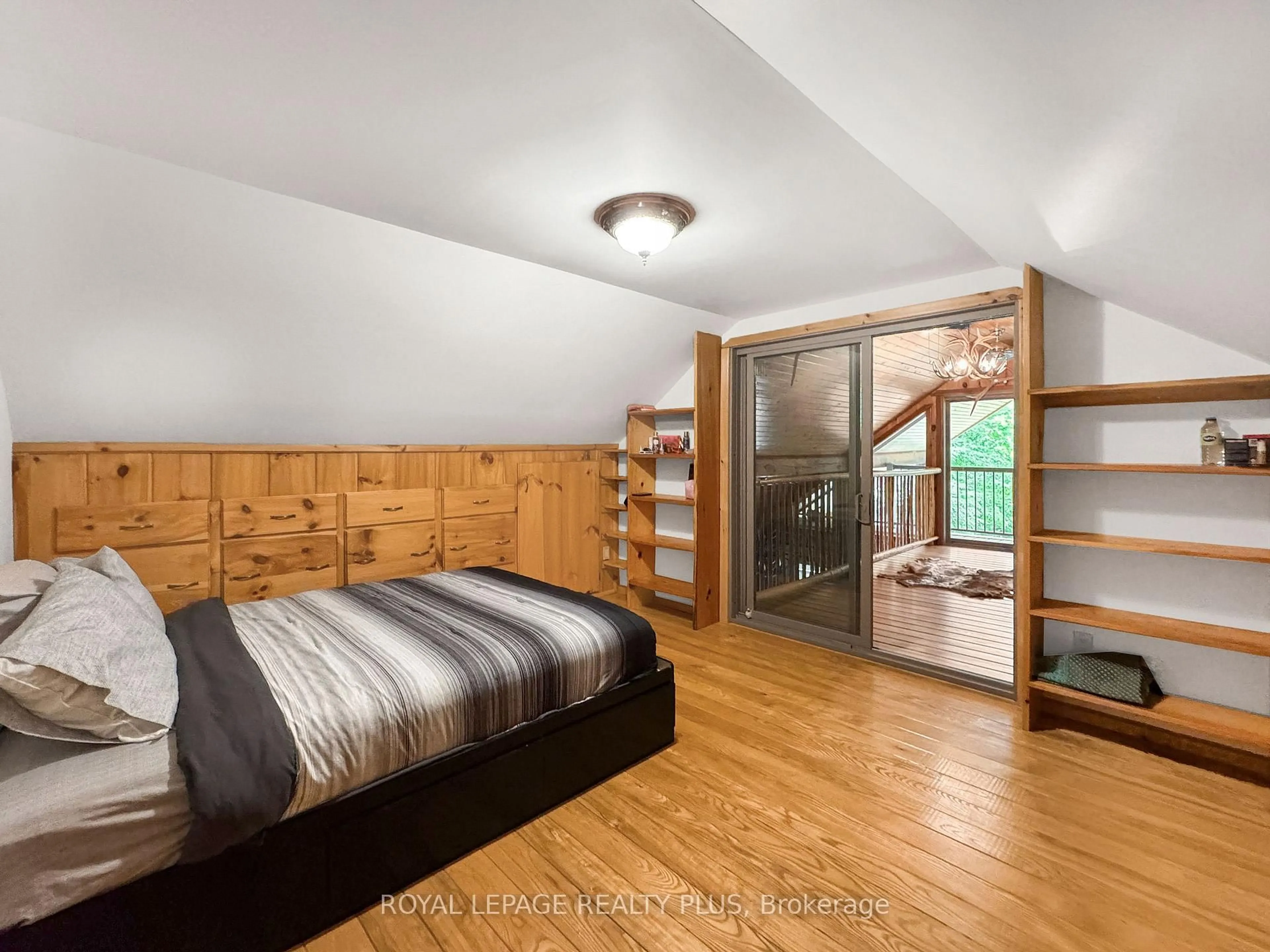Bedroom with bed, wood/laminate floor for 203 Cottage Lane, Carlow/Mayo Ontario K0L 2M0