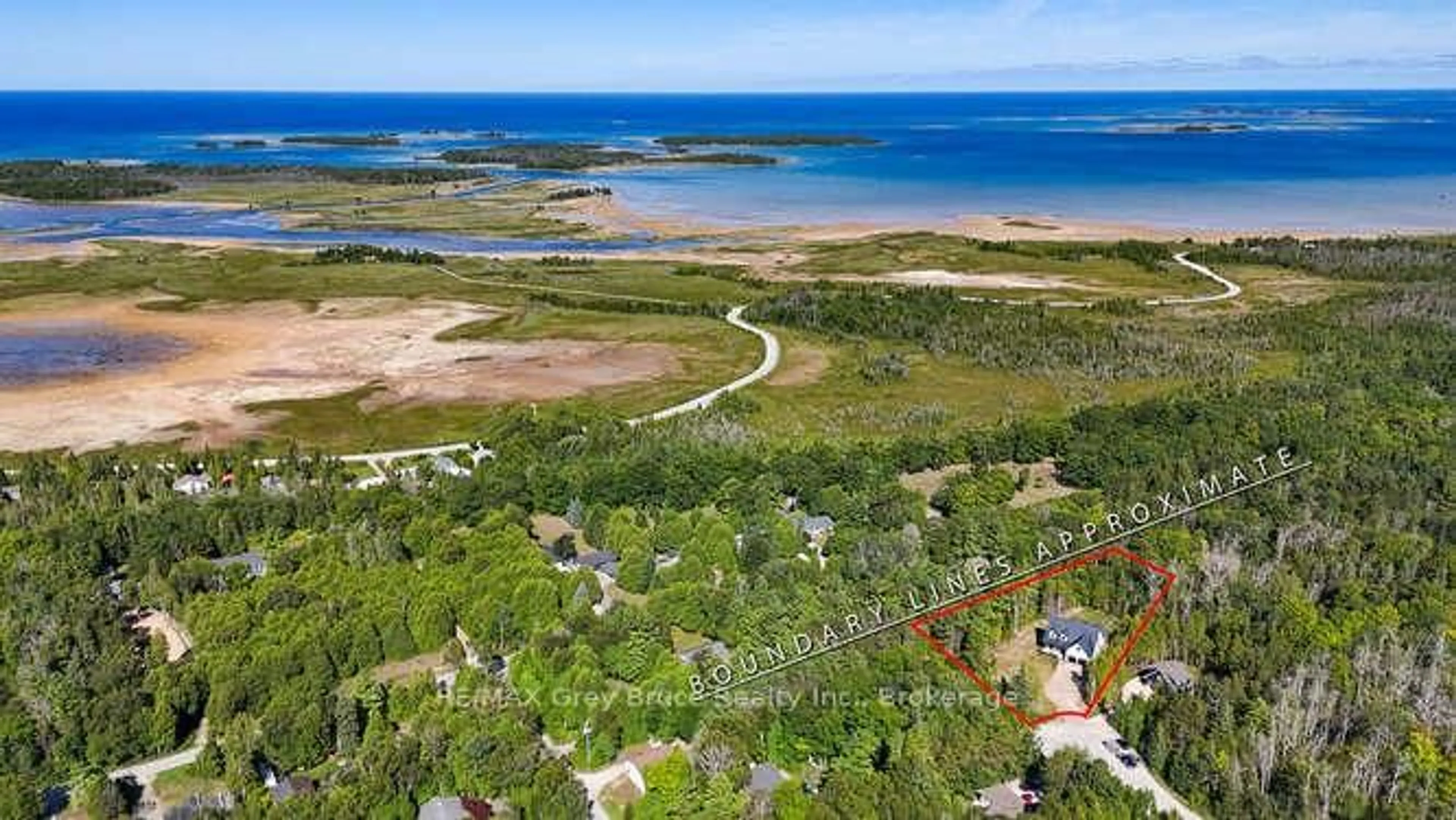 A pic from outside/outdoor area/front of a property/back of a property/a pic from drone, water/lake/river/ocean view for 24 Phillips Pl, South Bruce Peninsula Ontario N0H 2T0