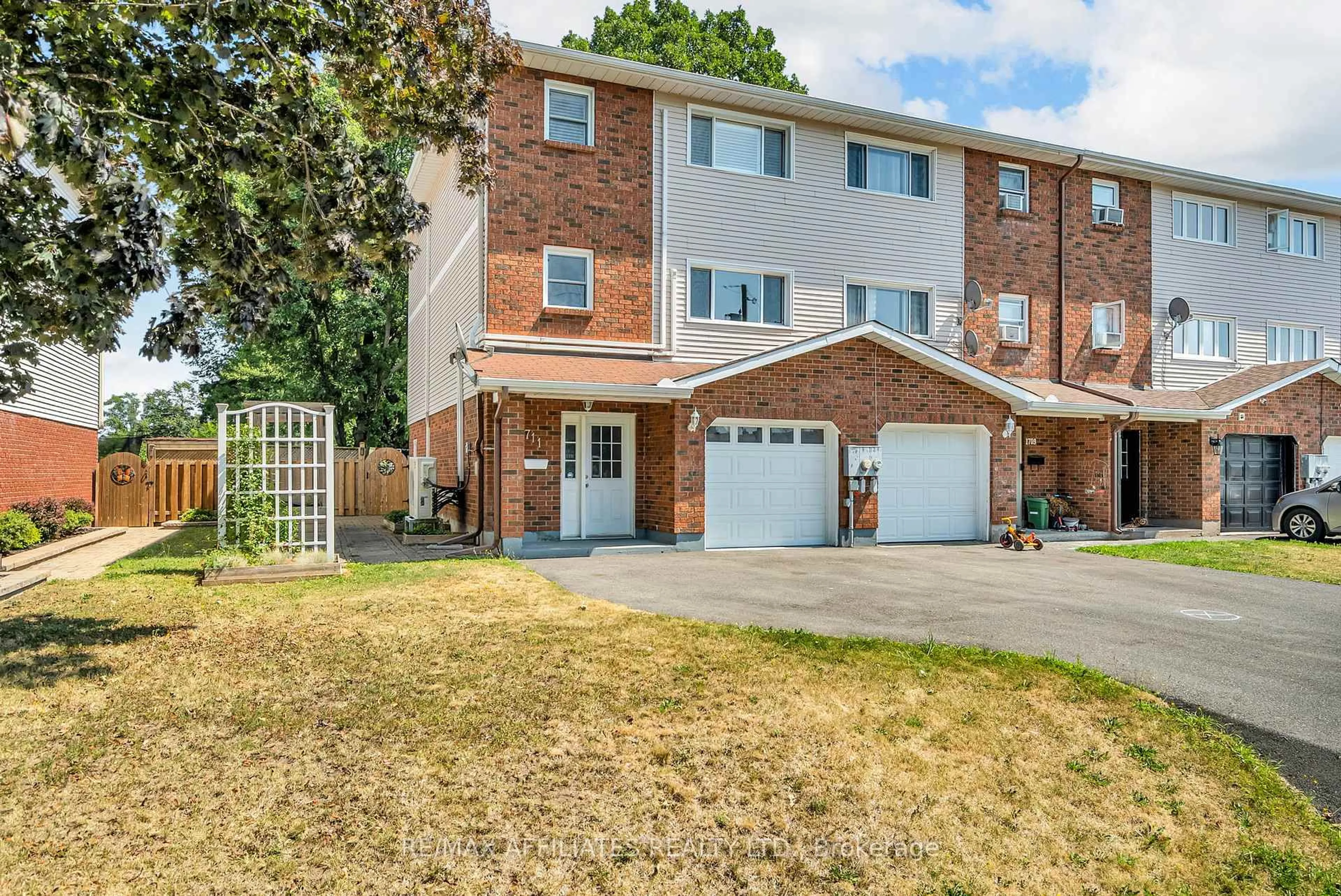 Home with brick exterior material, street for 1711 Donald Ave, Cornwall Ontario K6J 5R7