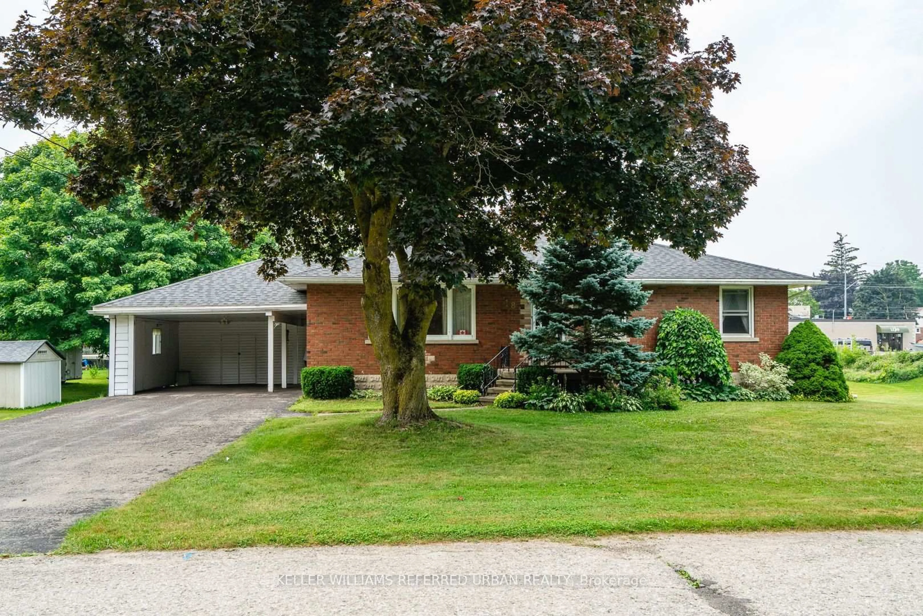 Home with brick exterior material, street for 18 King St, Minto Ontario N0G 1Z0