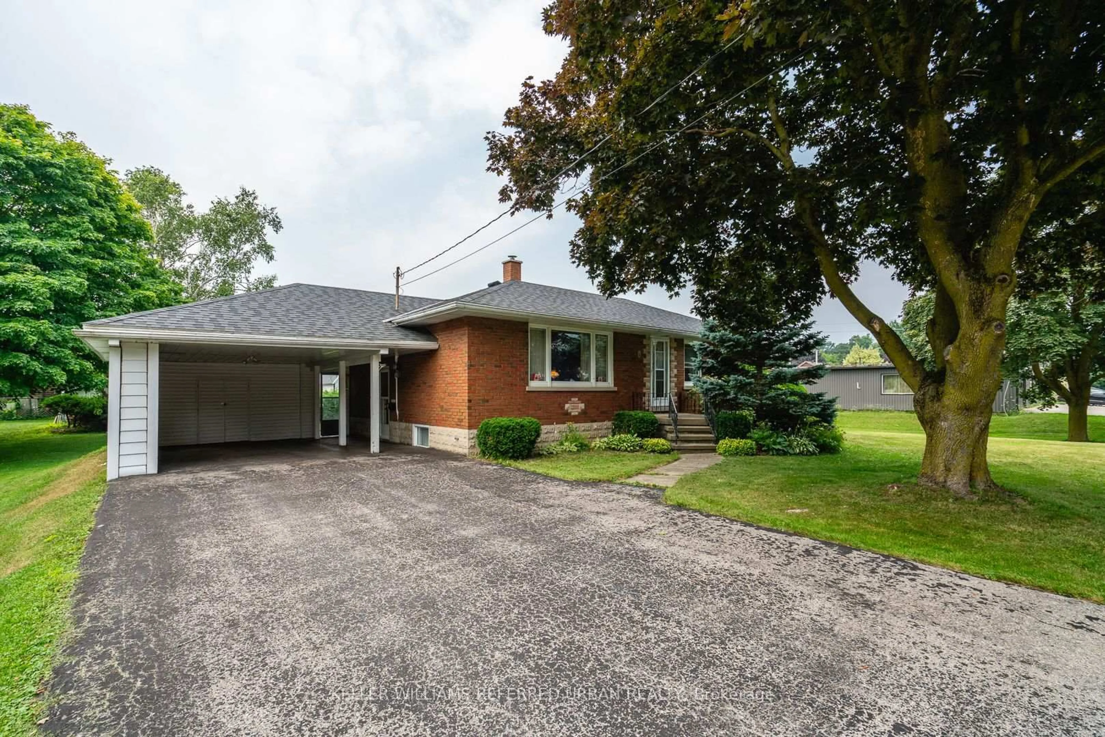 Home with brick exterior material, street for 18 King St, Minto Ontario N0G 1Z0