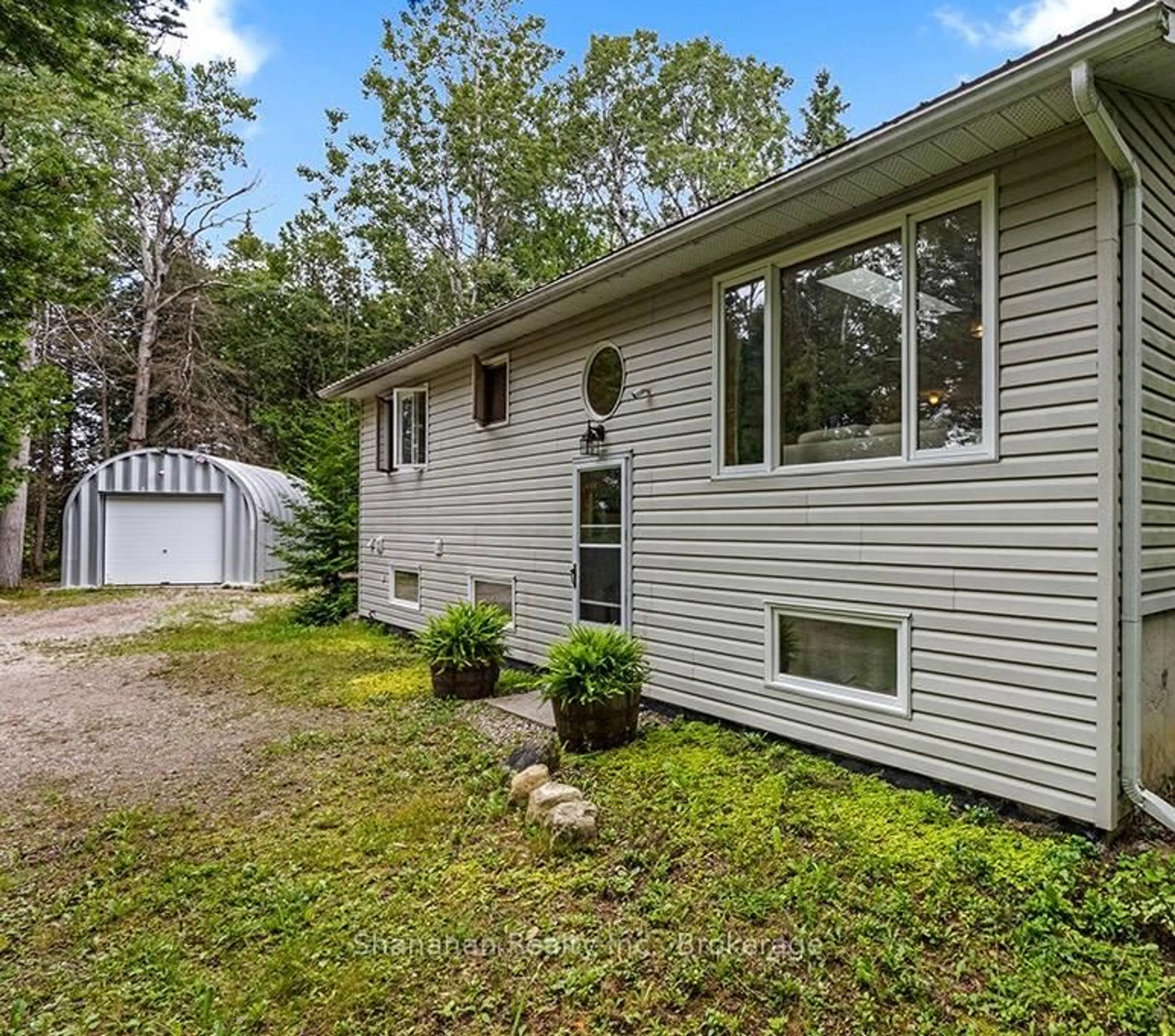 Home with vinyl exterior material, street for 175 Warner Bay Rd, Northern Bruce Peninsula Ontario N0H 2R0