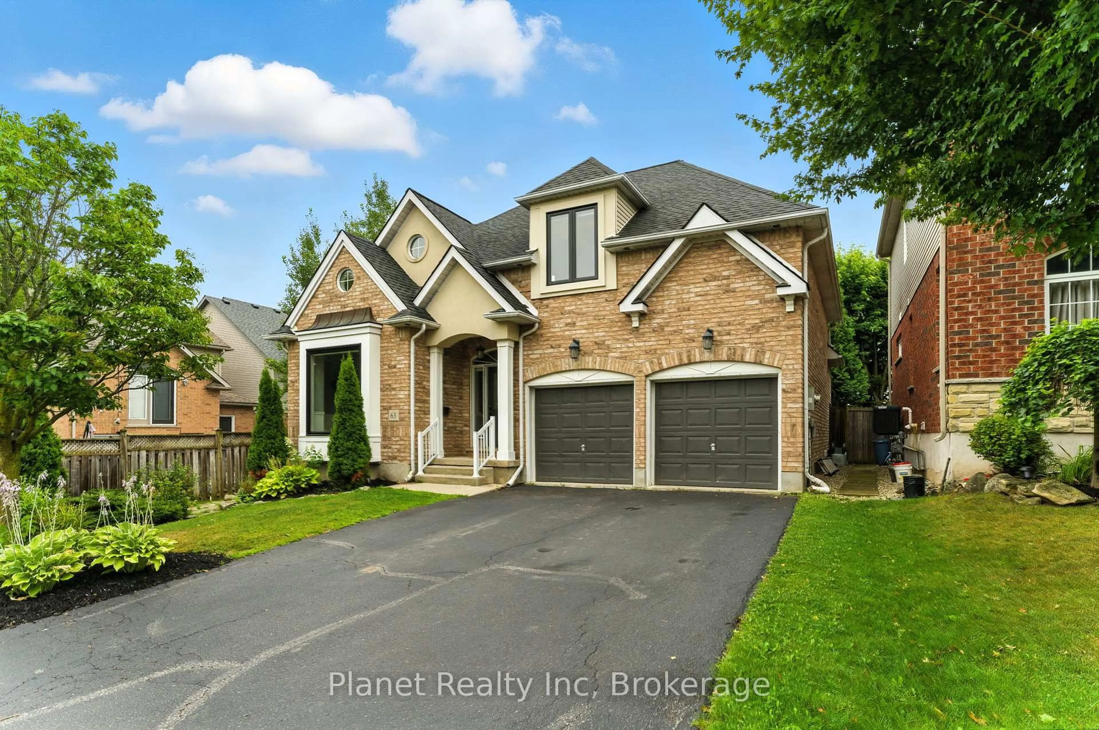 Home with brick exterior material, street for 63 Truesdale Cres, Guelph Ontario N1G 5H3