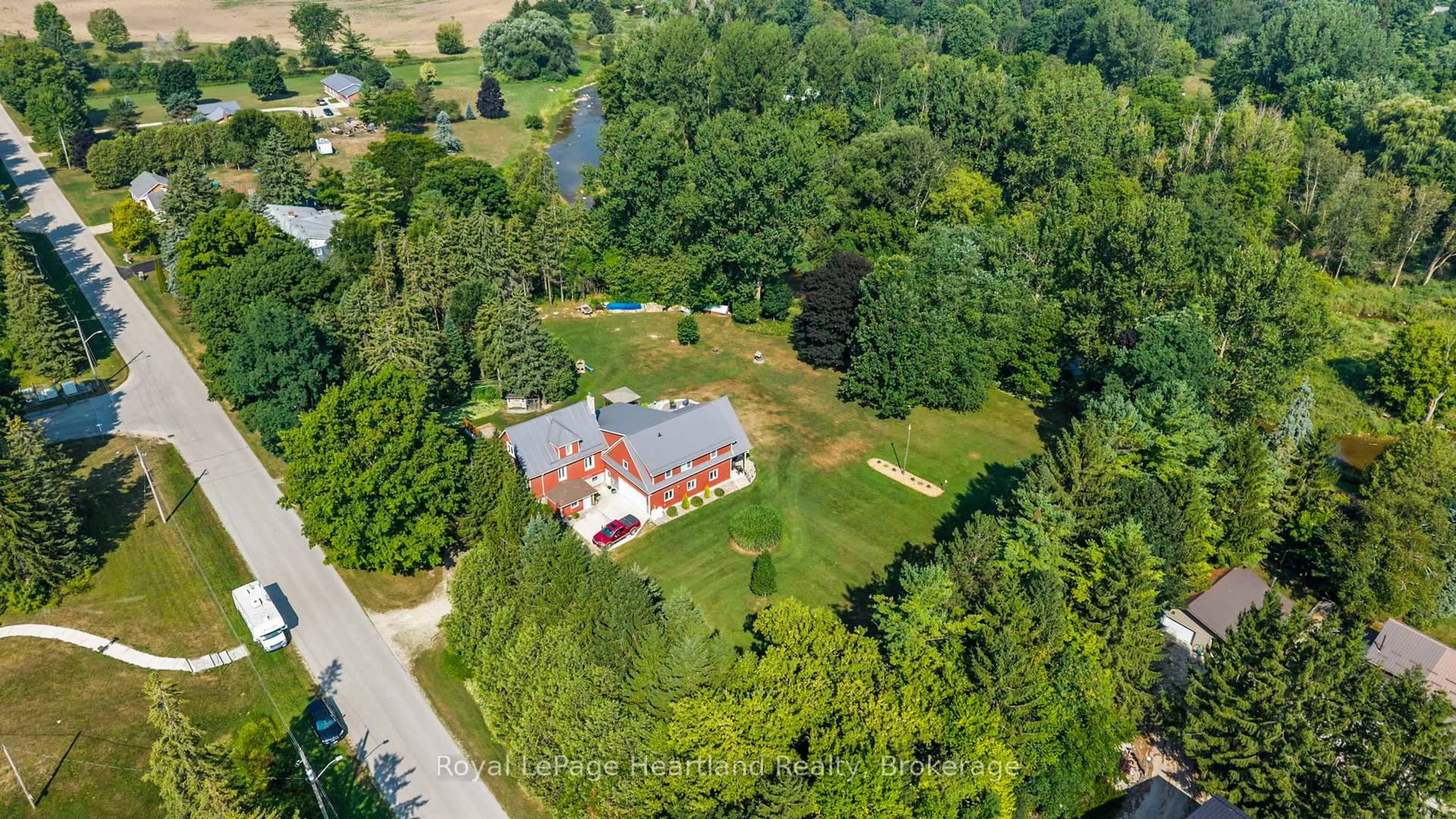 A pic from outside/outdoor area/front of a property/back of a property/a pic from drone, water/lake/river/ocean view for 1043 Queen St, Howick Ontario N0G 2X0