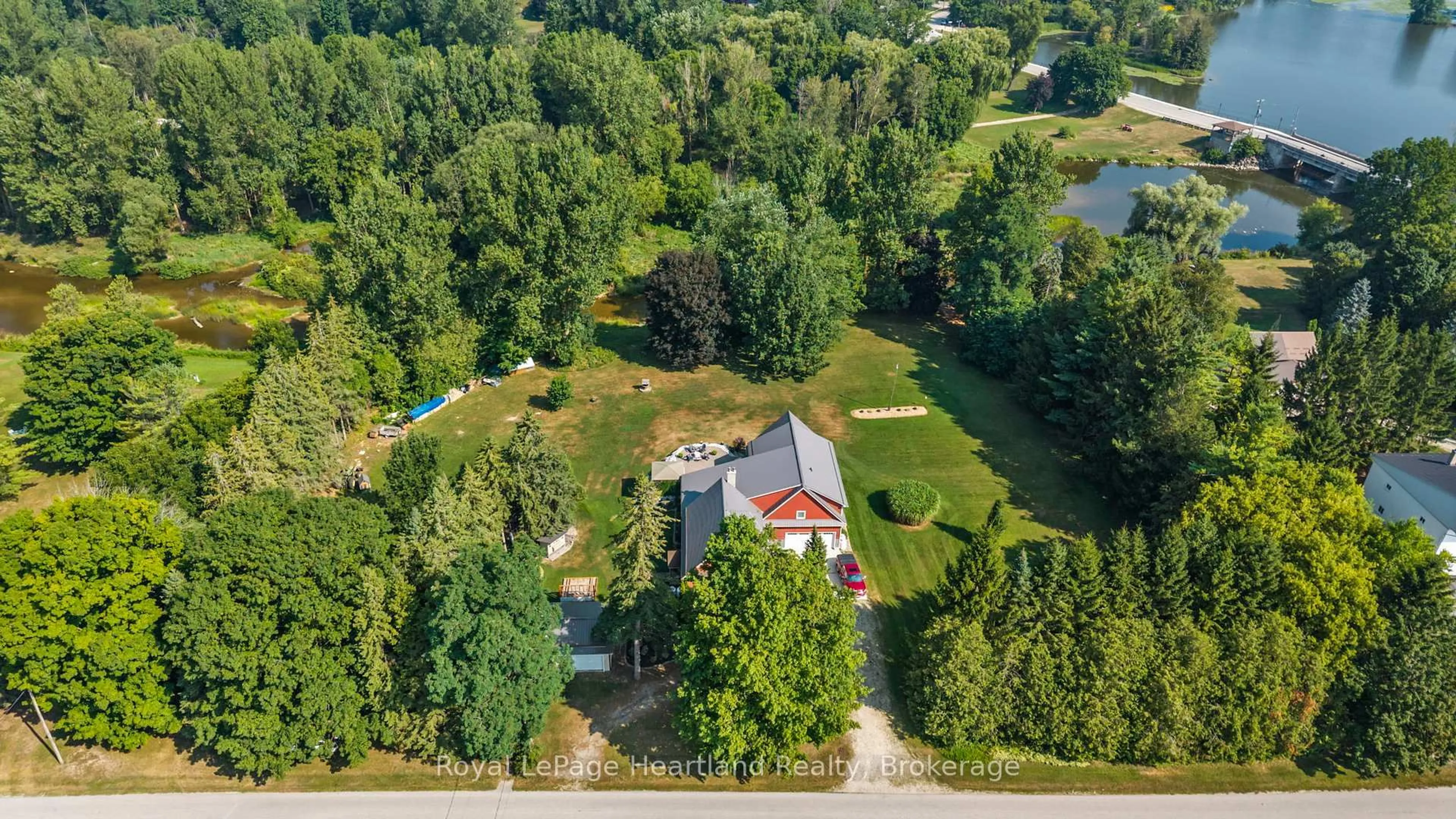 A pic from outside/outdoor area/front of a property/back of a property/a pic from drone, water/lake/river/ocean view for 1043 Queen St, Howick Ontario N0G 2X0