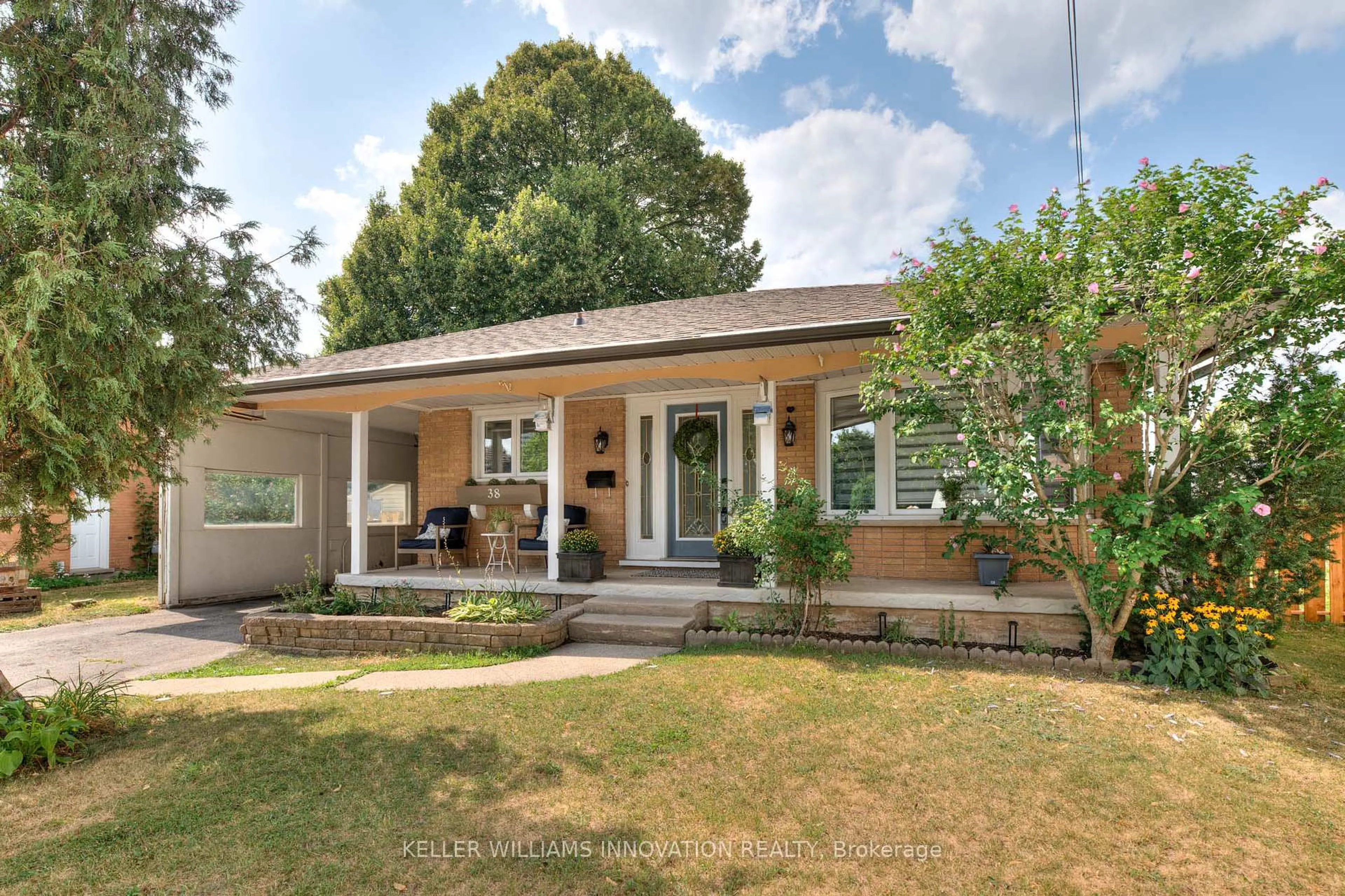 Home with brick exterior material, street for 38 Fairlawn Rd, Kitchener Ontario N2C 1X9