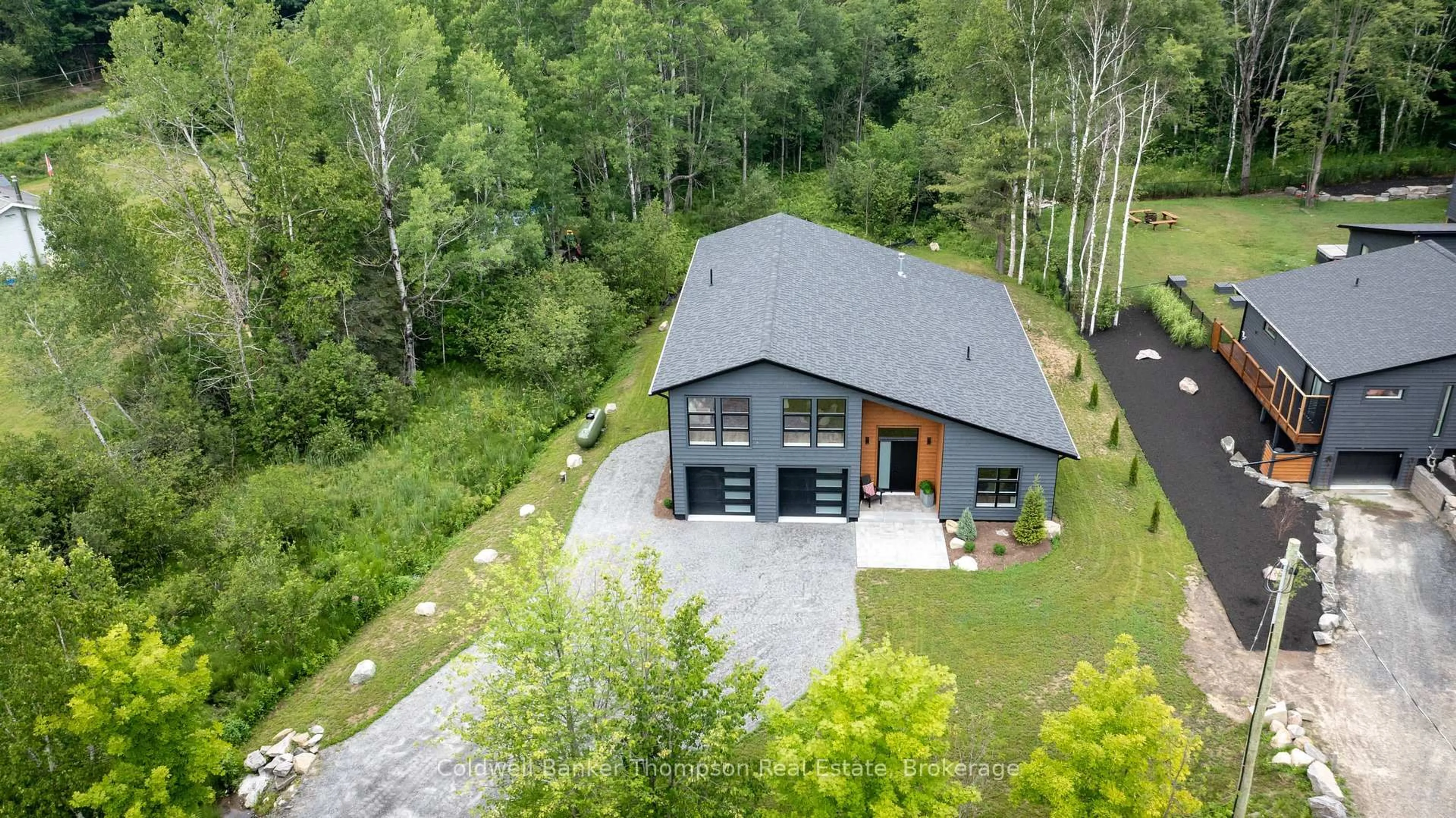A pic from outside/outdoor area/front of a property/back of a property/a pic from drone, unknown for 120 Vernon Shores Ave, Huntsville Ontario P1H 2J2