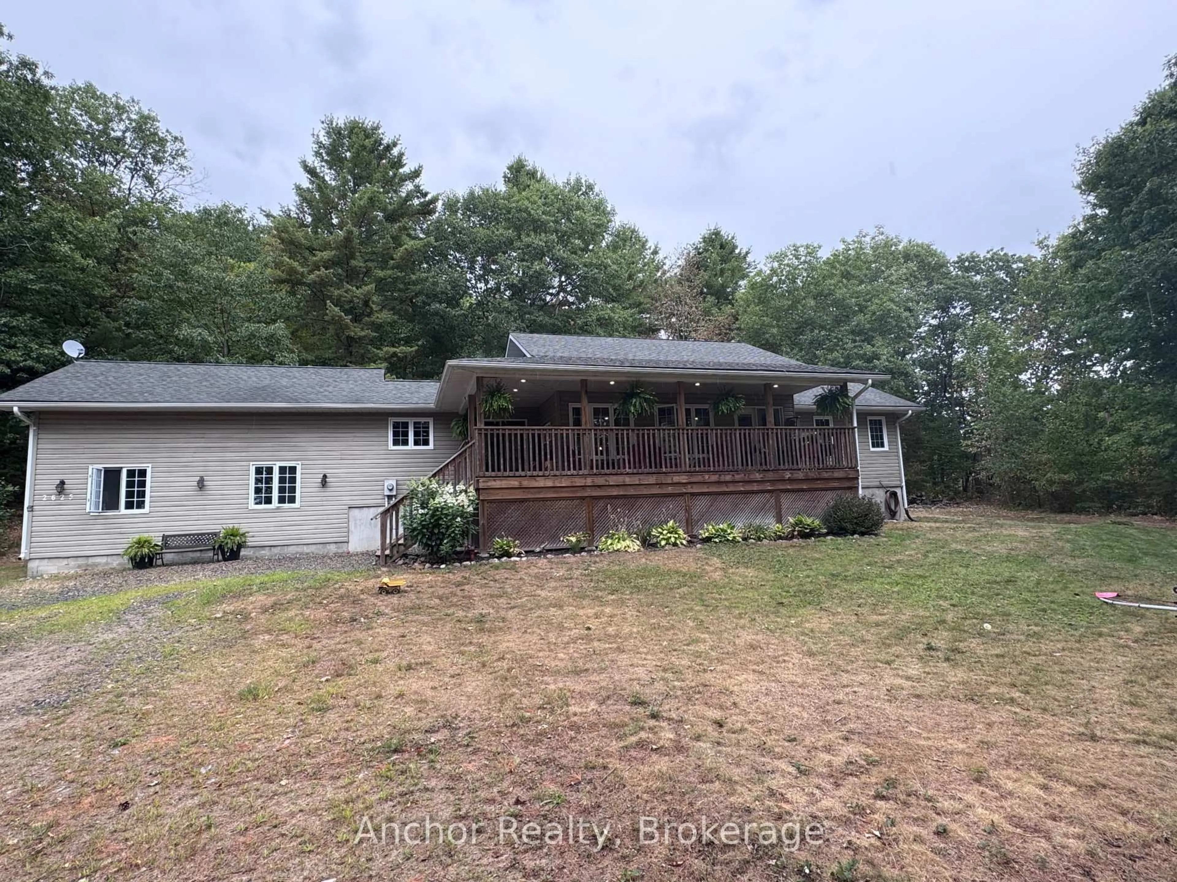 A pic from outside/outdoor area/front of a property/back of a property/a pic from drone, water/lake/river/ocean view for 2625 Fred Jones Rd, Dysart et al Ontario K0M 1S0