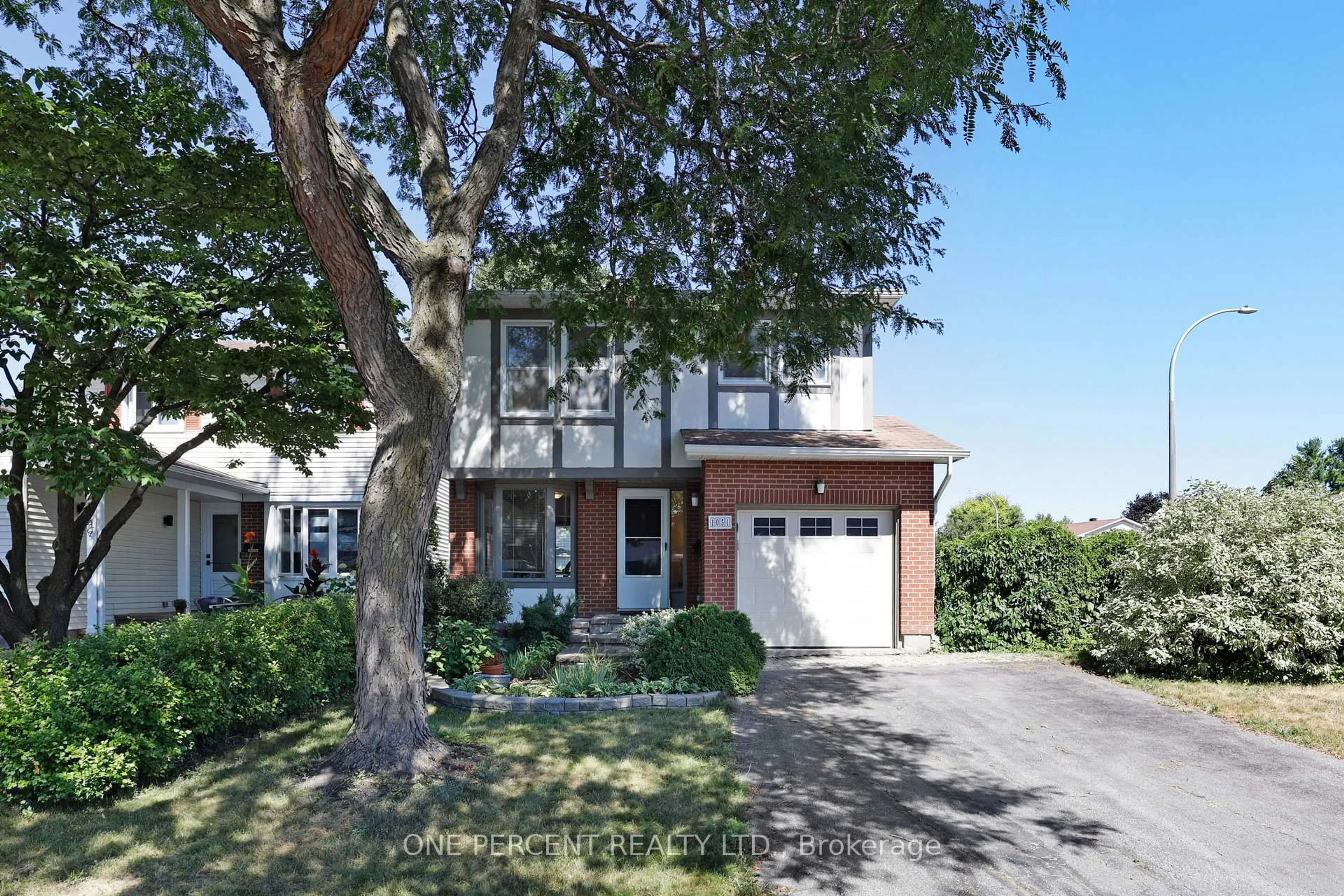 Home with brick exterior material, street for 1051 Arrowhead Pl, Ottawa Ontario K1C 2S5