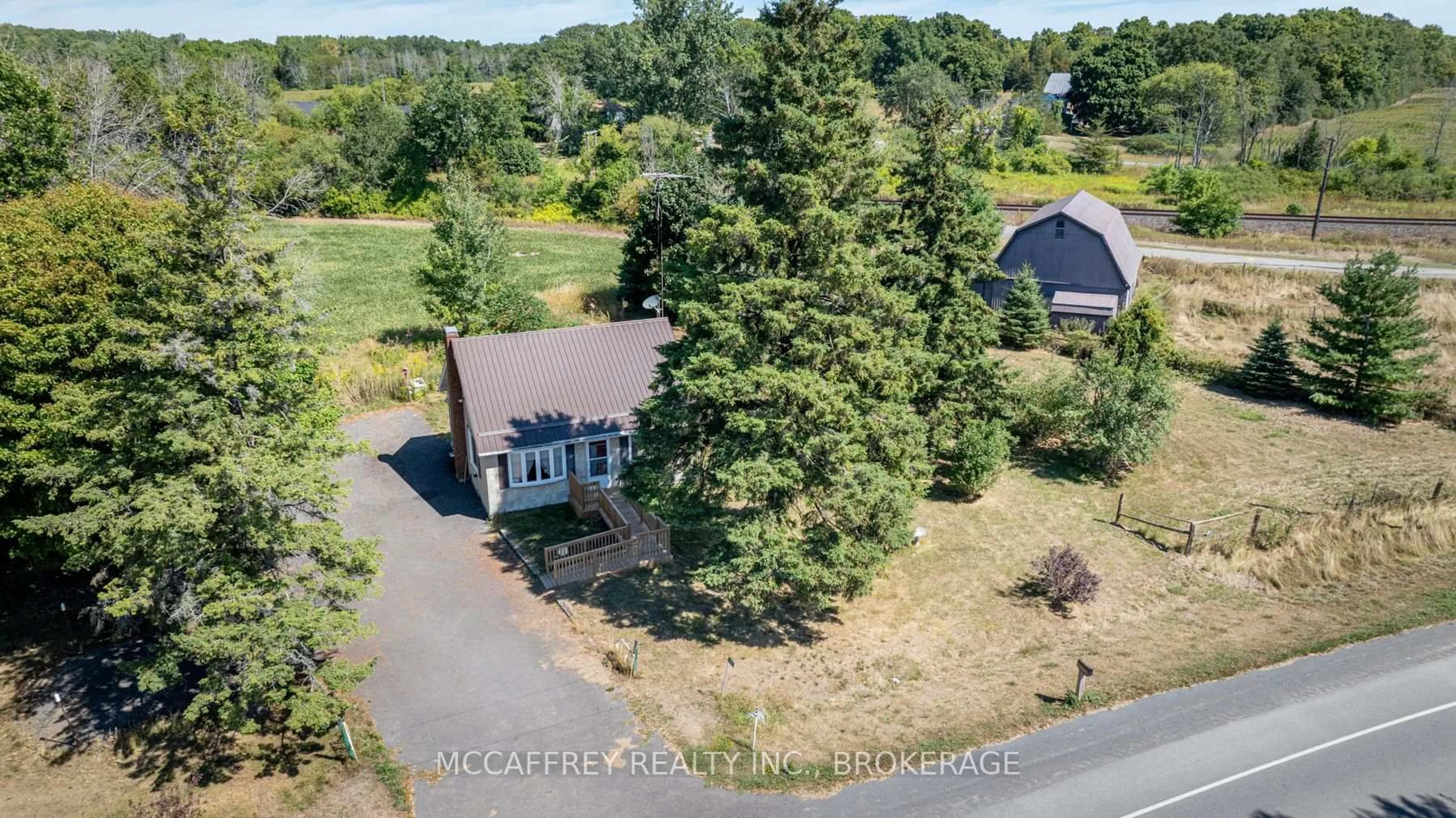 A pic from outside/outdoor area/front of a property/back of a property/a pic from drone, street for 533 County Rd 8, Greater Napanee Ontario K7R 0E3