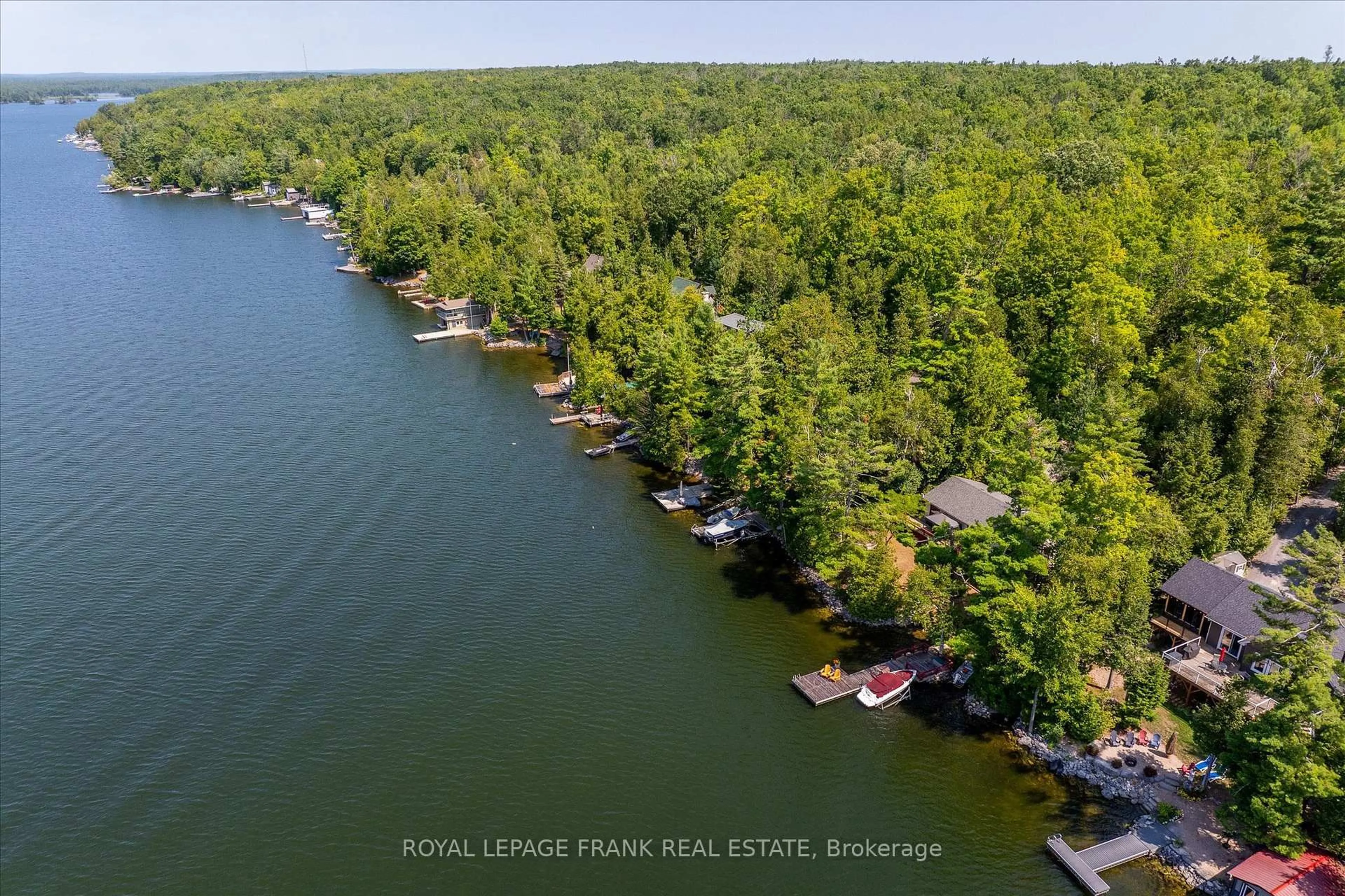 A pic from outside/outdoor area/front of a property/back of a property/a pic from drone, water/lake/river/ocean view for 2724 Newcomb Lane, Selwyn Ontario K0L 2H0