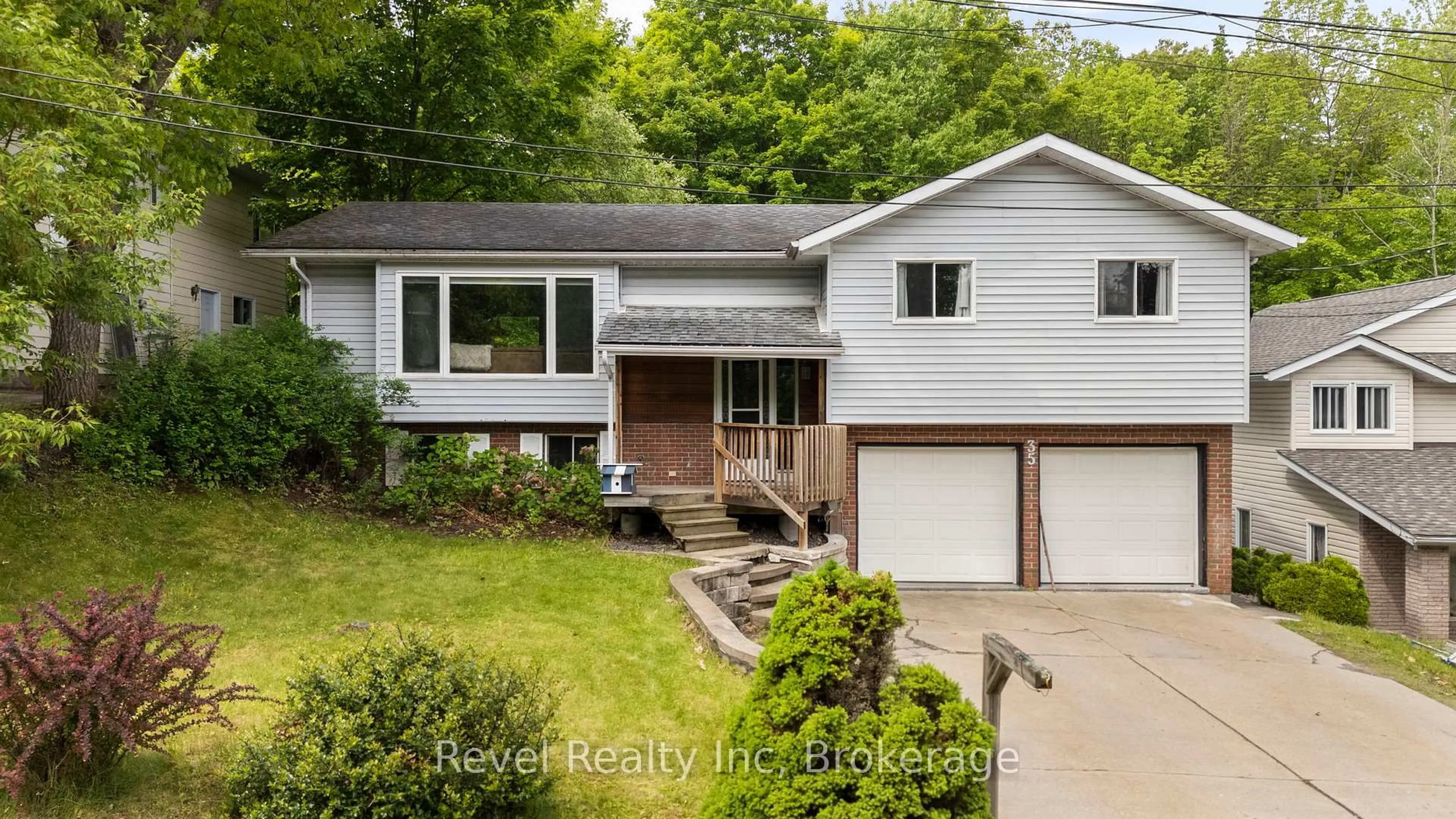 Home with vinyl exterior material, street for 35 Macklaim Dr, Parry Sound Ontario P2A 2Z7