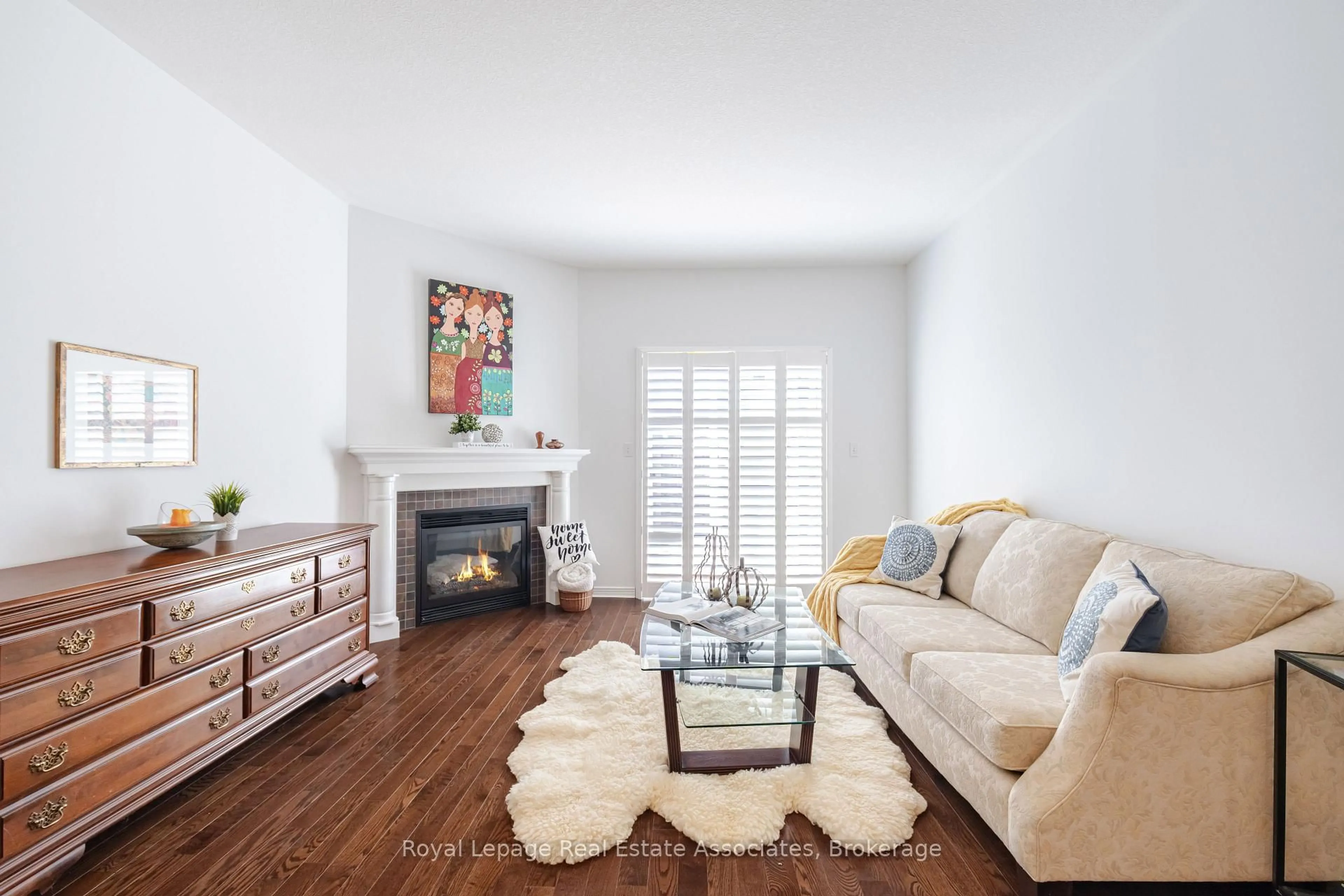 Living room with furniture, wood/laminate floor for 10 Cornflower Cres, Hamilton Ontario L0R 1P0
