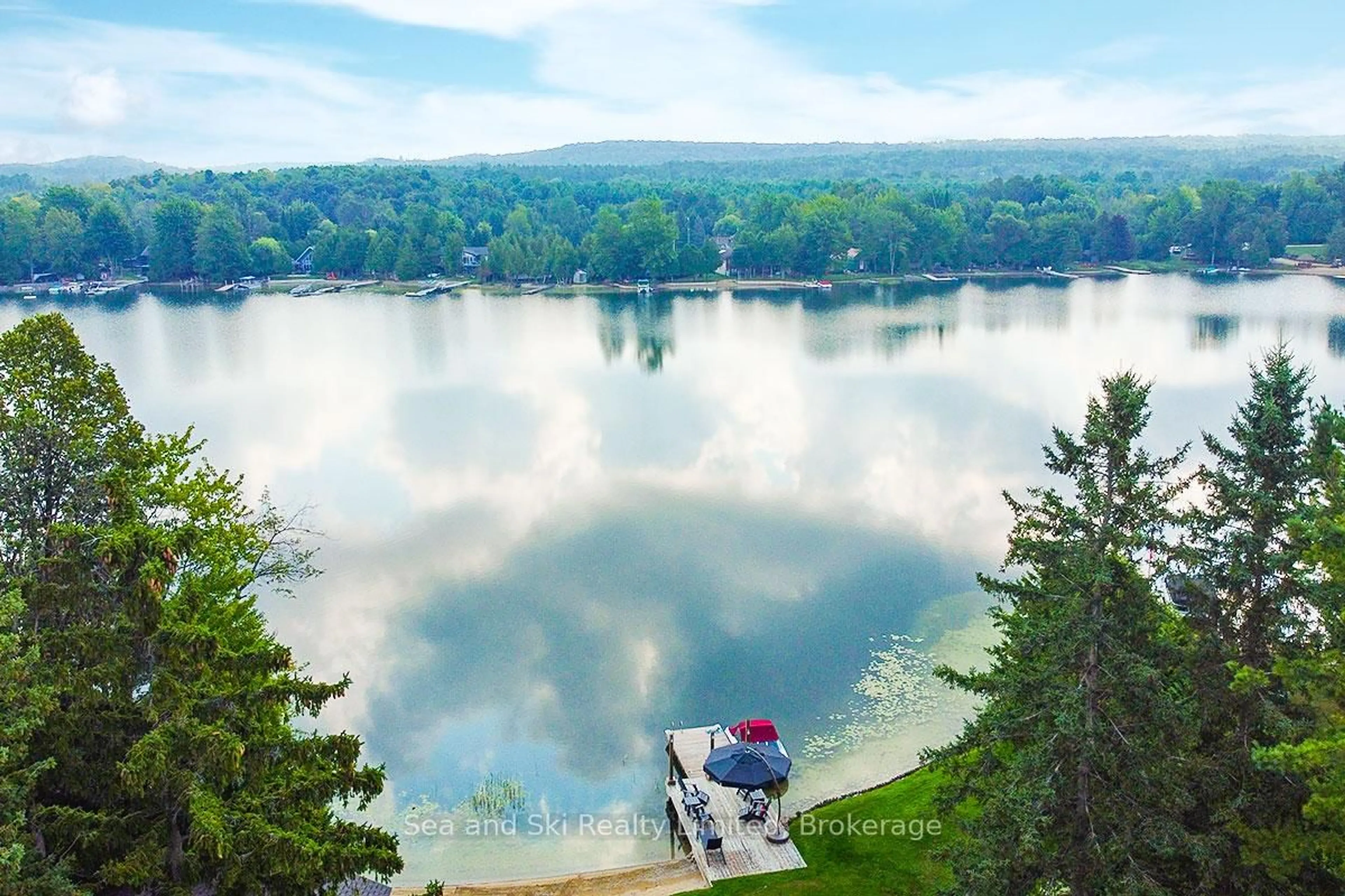 A pic from outside/outdoor area/front of a property/back of a property/a pic from drone, water/lake/river/ocean view for 102 Mccullough Lake Dr, Chatsworth Ontario N0H 2V0