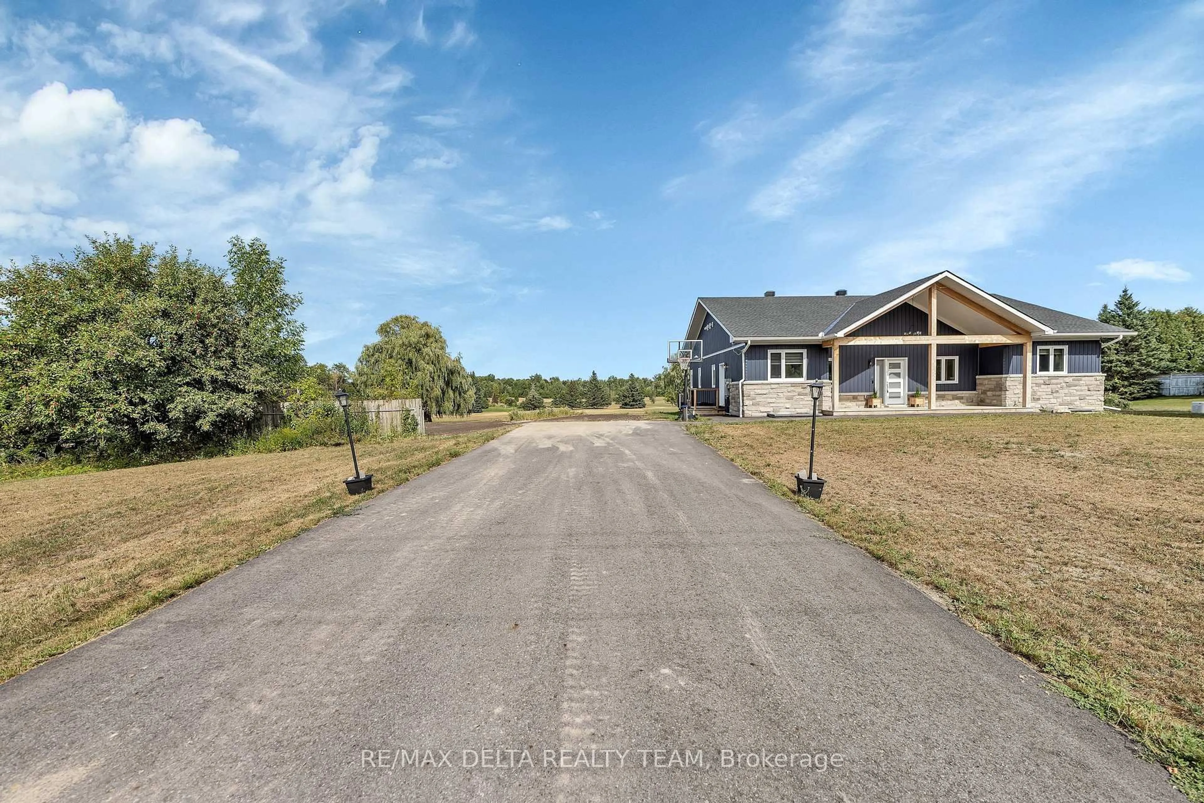 A pic from outside/outdoor area/front of a property/back of a property/a pic from drone, street for 4645 Mcneely Rd Rd, Navan Ontario K4B 1J1