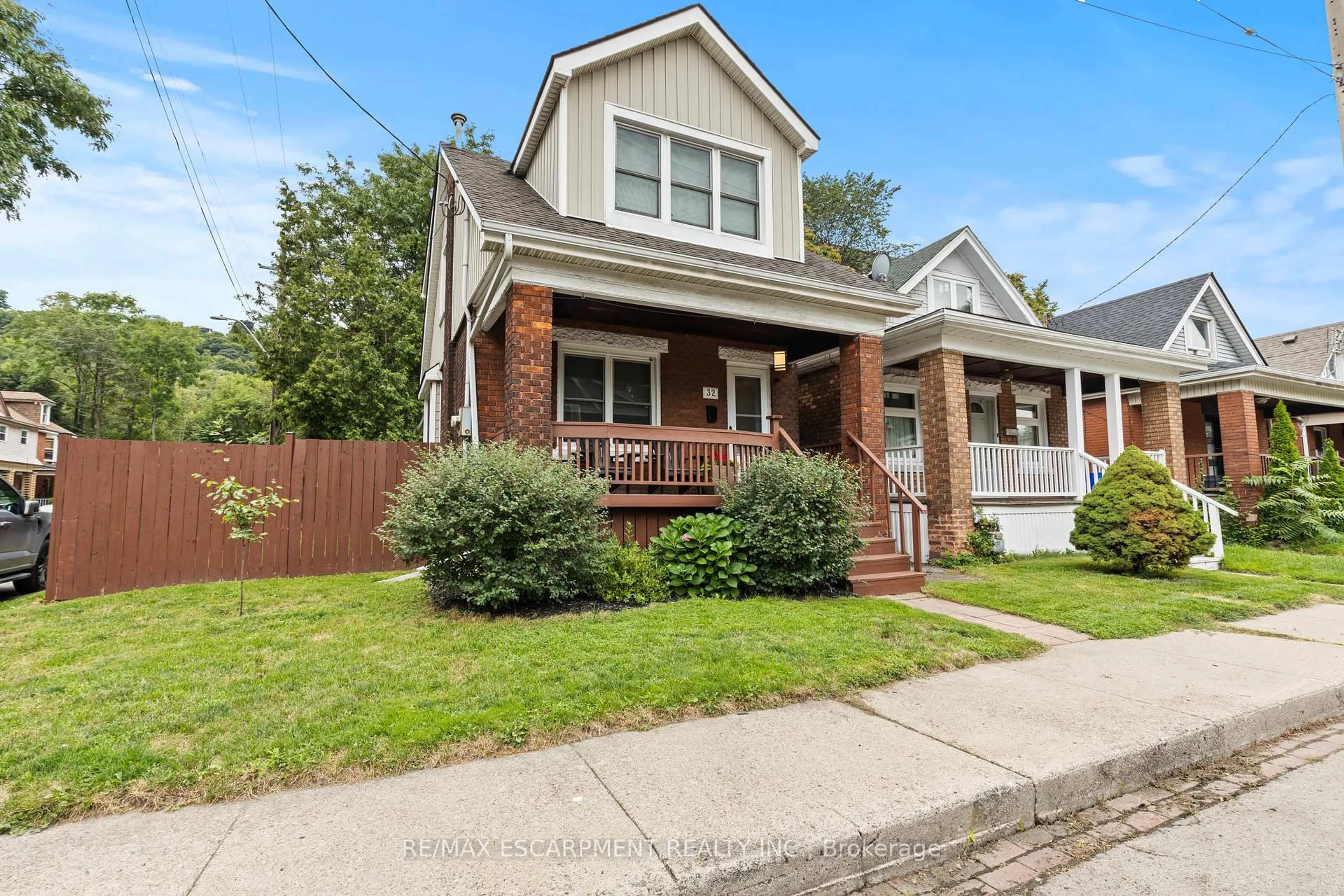 Home with brick exterior material, street for 32 Webber Ave, Hamilton Ontario L8N 1W3