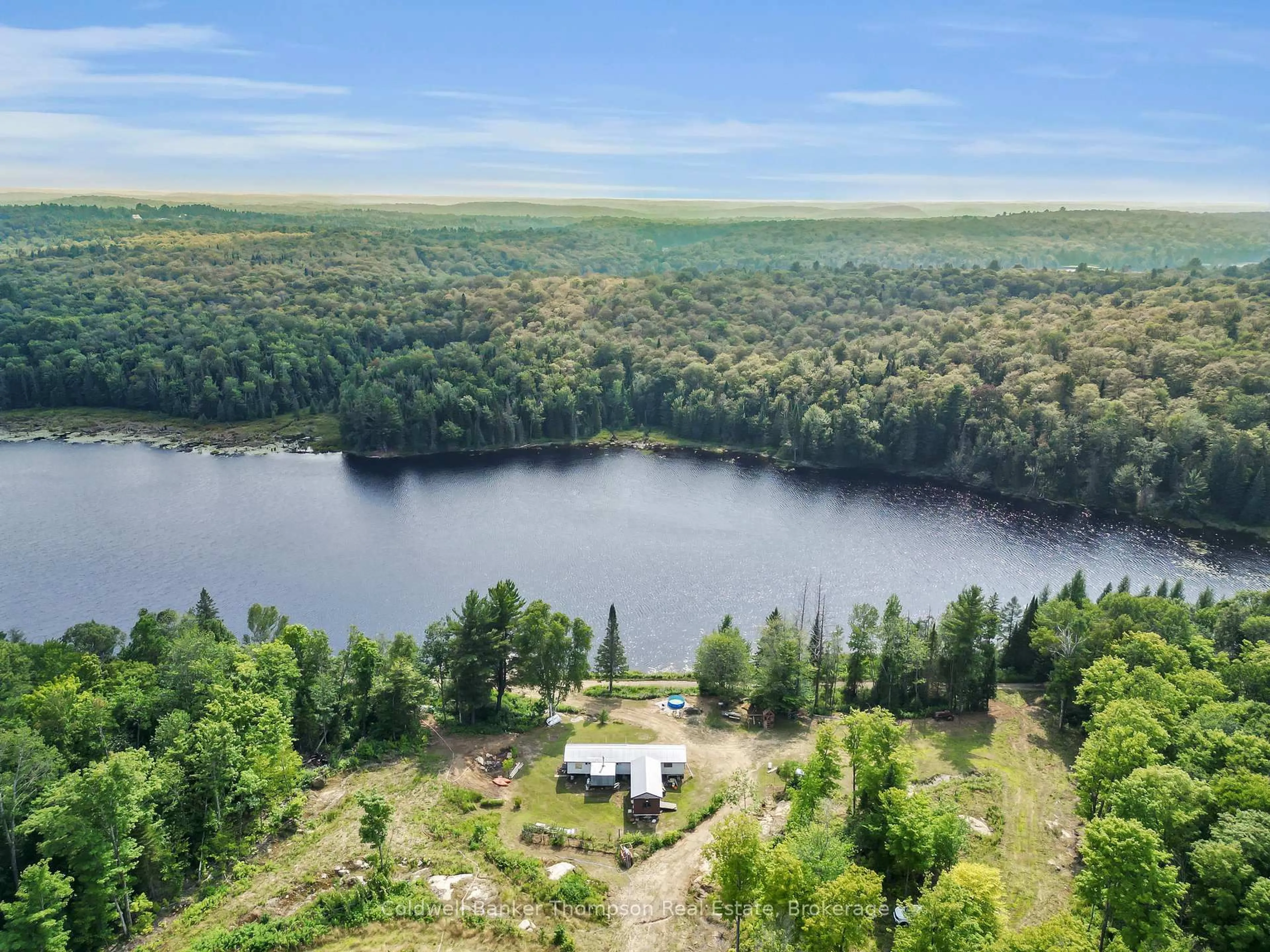 A pic from outside/outdoor area/front of a property/back of a property/a pic from drone, water/lake/river/ocean view for 0 Seguin Tr, Perry Ontario P0A 1J0