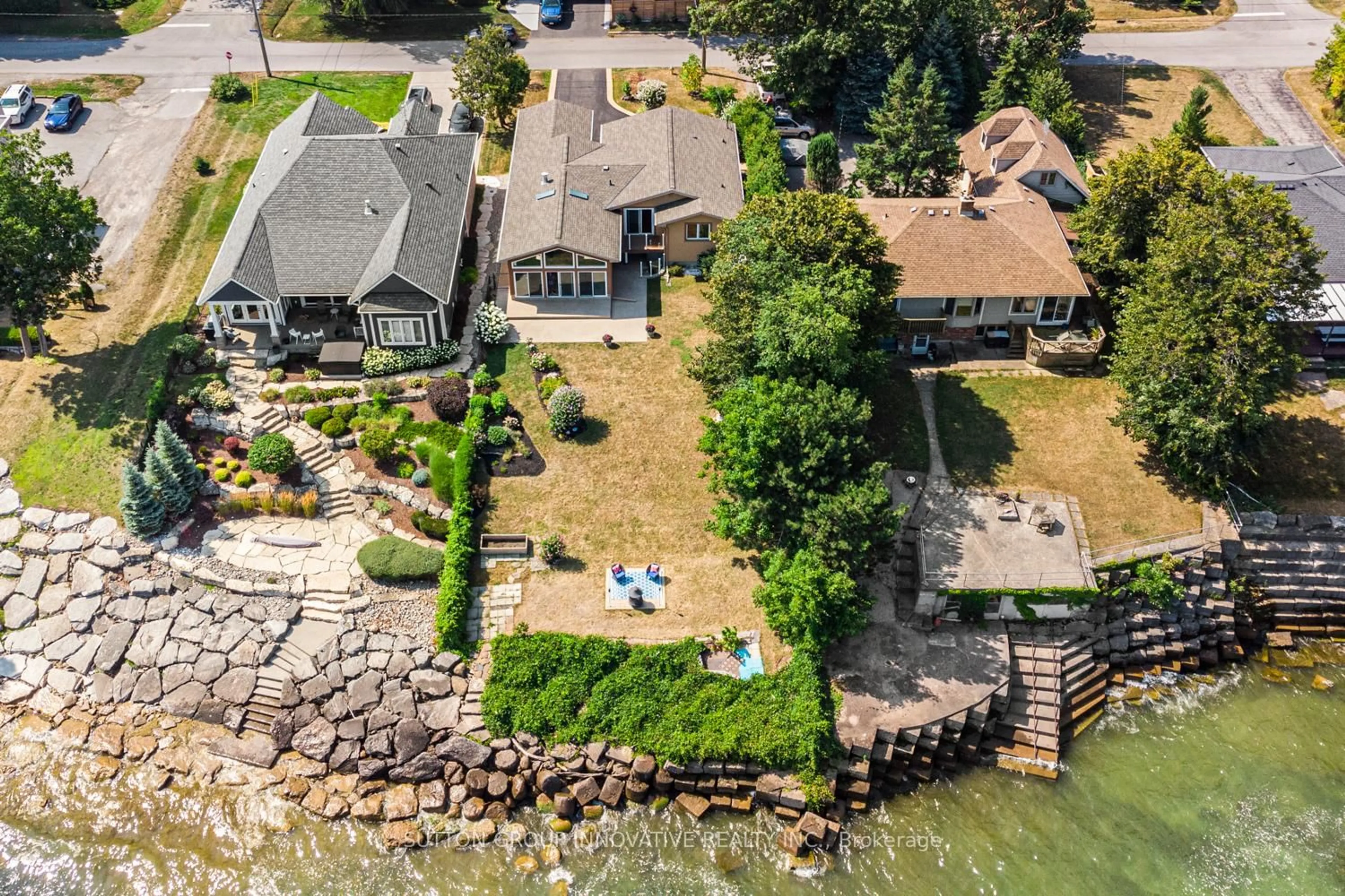 A pic from outside/outdoor area/front of a property/back of a property/a pic from drone, water/lake/river/ocean view for 38 Lakeside Dr, Grimsby Ontario L3M 2L2