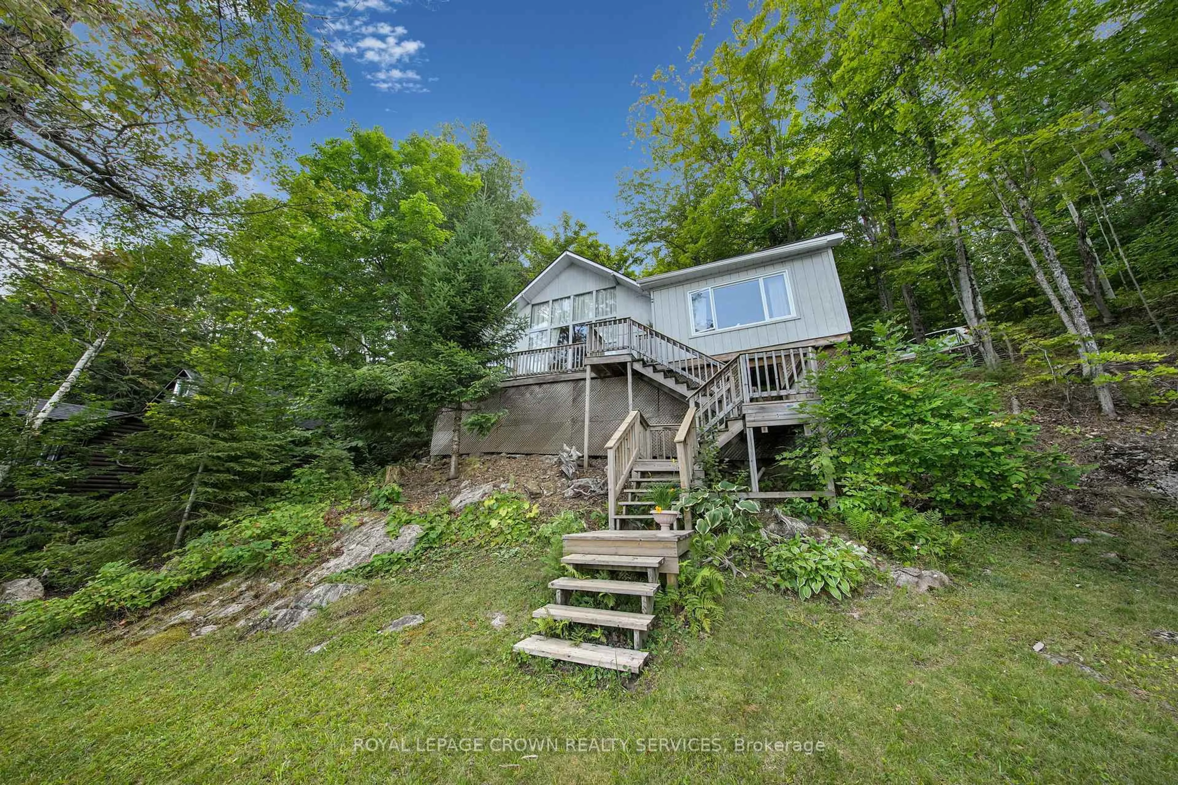 A pic from outside/outdoor area/front of a property/back of a property/a pic from drone, water/lake/river/ocean view for 2726 Kushog Lake Rd, Algonquin Highlands Ontario K0M 1J2