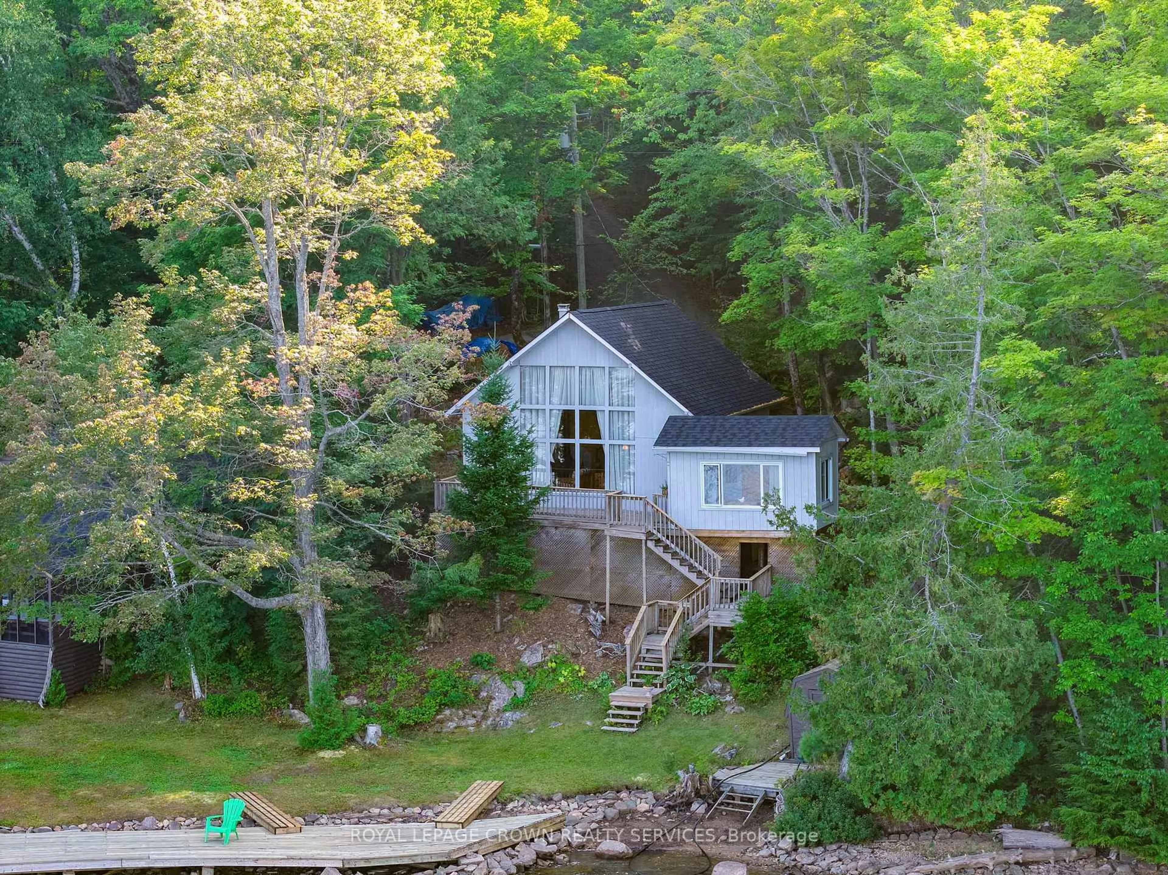 A pic from outside/outdoor area/front of a property/back of a property/a pic from drone, water/lake/river/ocean view for 2726 Kushog Lake Rd, Algonquin Highlands Ontario K0M 1J2