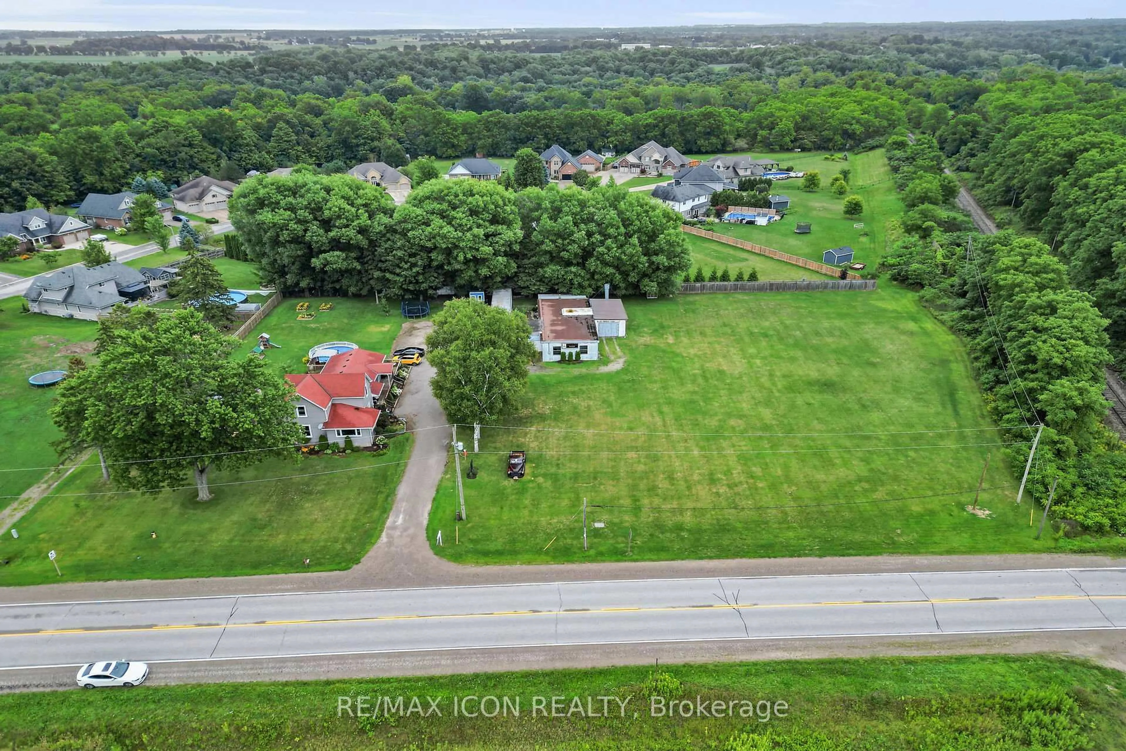 A pic from outside/outdoor area/front of a property/back of a property/a pic from drone, water/lake/river/ocean view for 9664 Belmont Rd, Central Elgin Ontario N5P 3S7