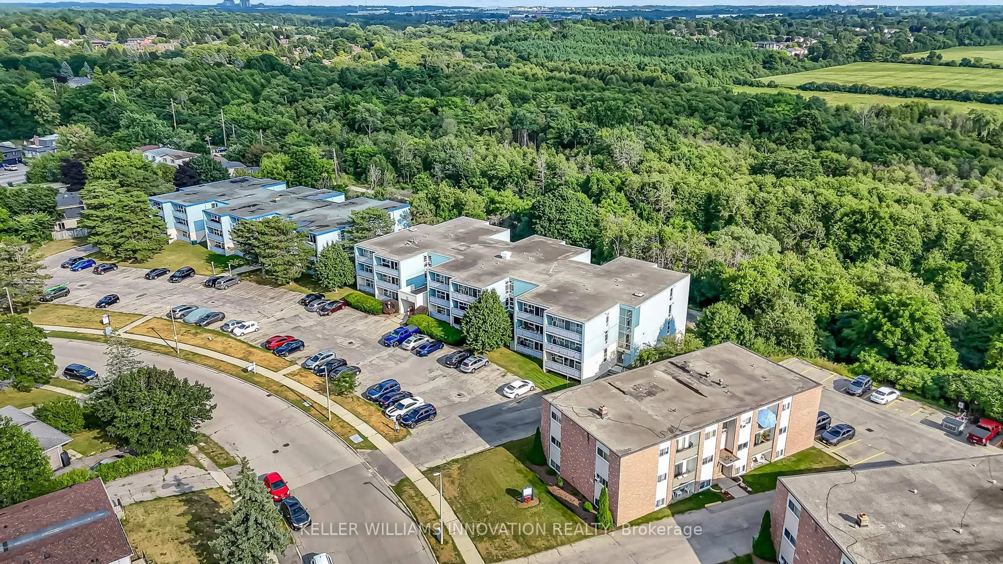 A pic from outside/outdoor area/front of a property/back of a property/a pic from drone, unknown for 91 Conroy Cres #307, Guelph Ontario N1G 2V5
