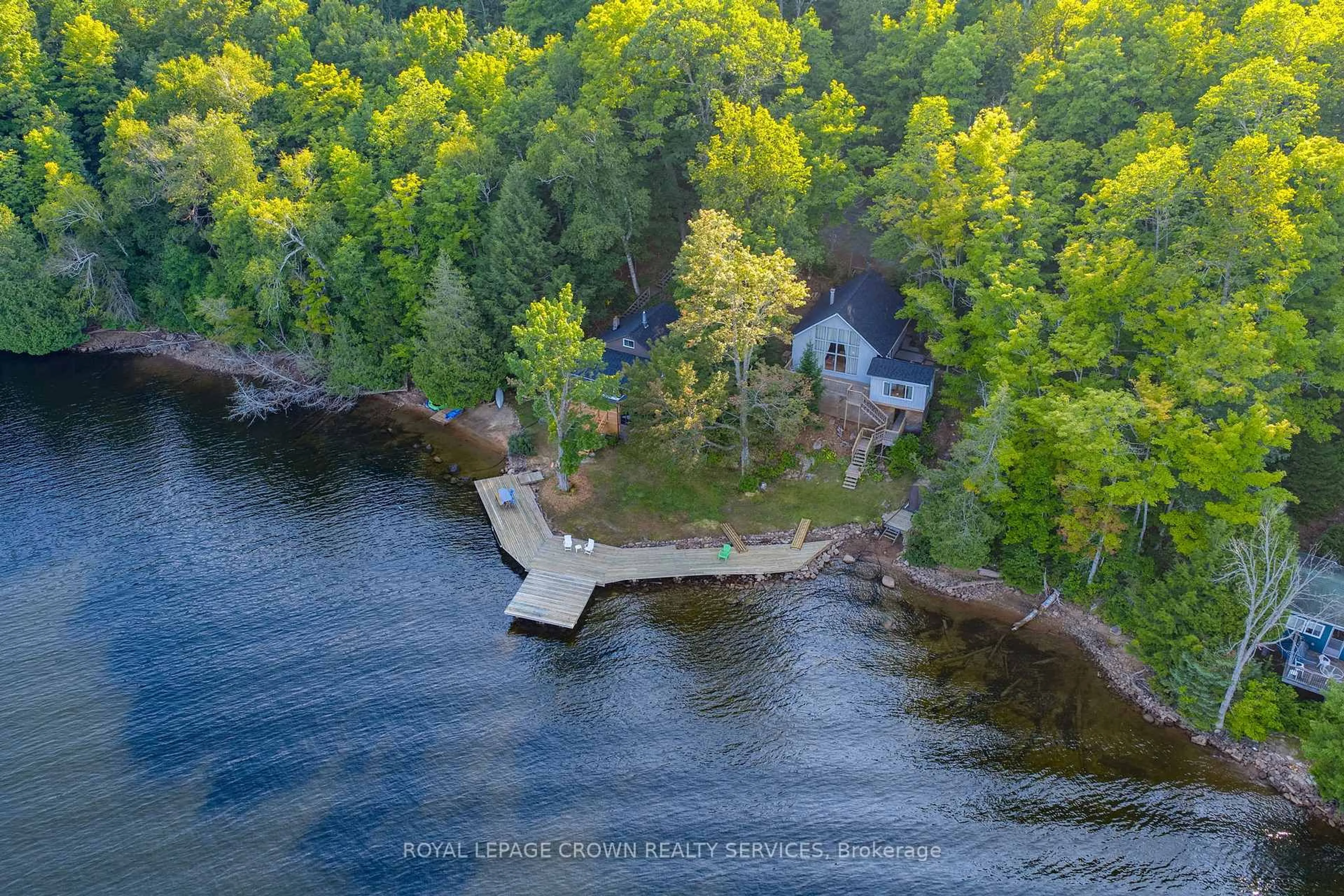 A pic from outside/outdoor area/front of a property/back of a property/a pic from drone, water/lake/river/ocean view for 2724/26 Kushog Lake Rd, Algonquin Highlands Ontario K0M 1J2