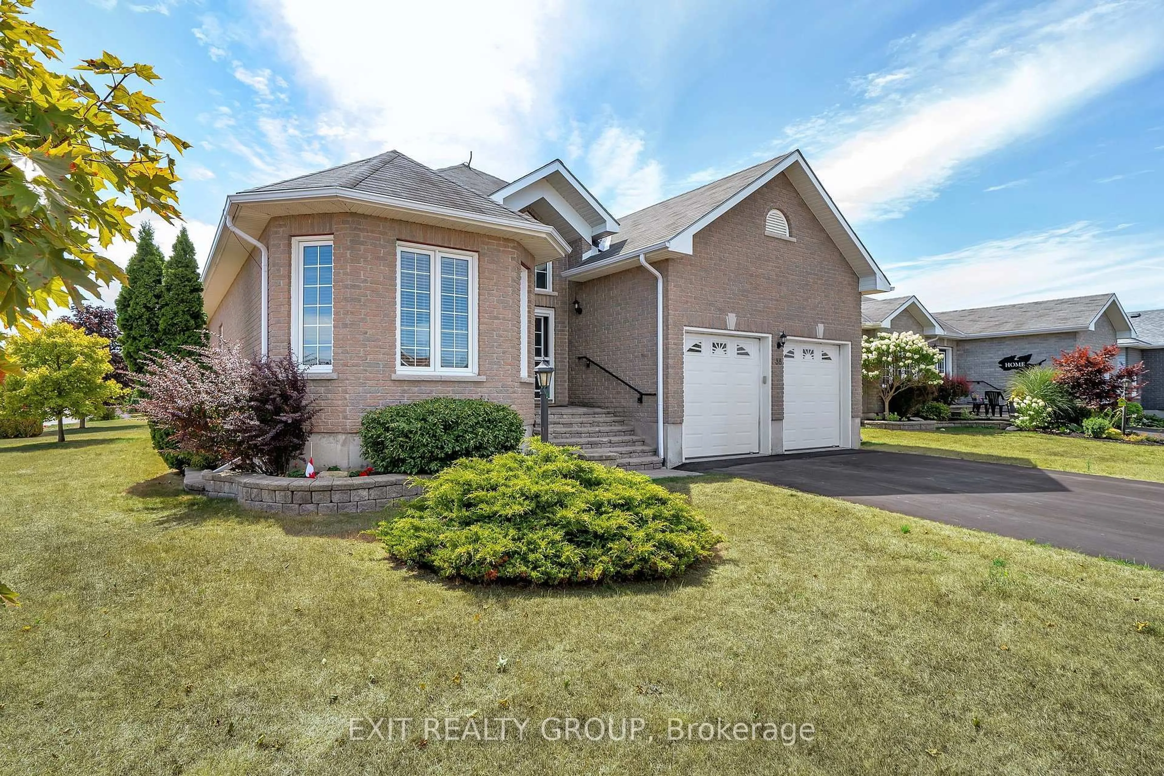 Home with vinyl exterior material, street for 38 Aletha Dr, Prince Edward County Ontario K0K 3L0