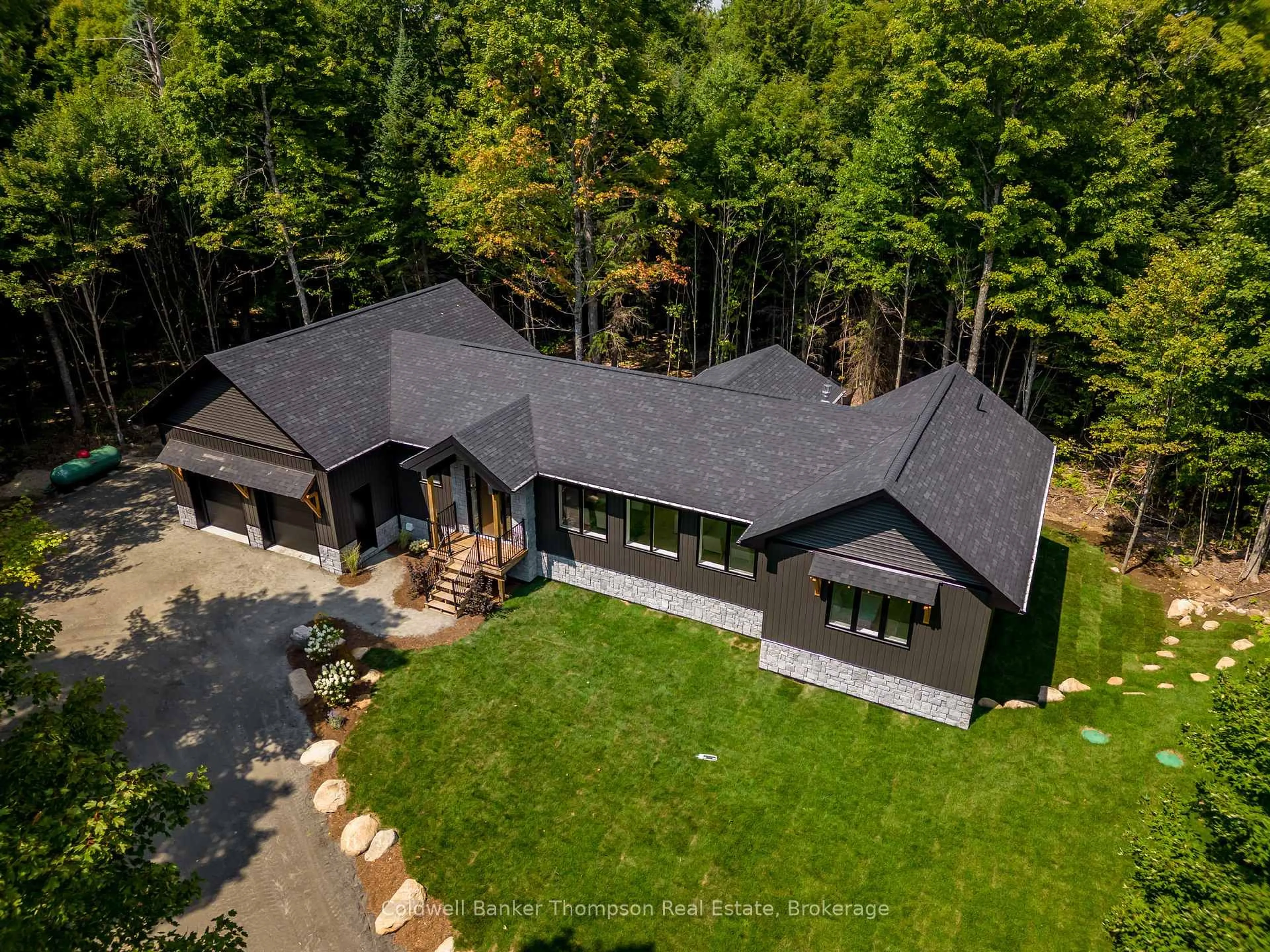 A pic from outside/outdoor area/front of a property/back of a property/a pic from drone, forest/trees view for 2341 Limberlost Rd, Lake of Bays Ontario P1H 2J6