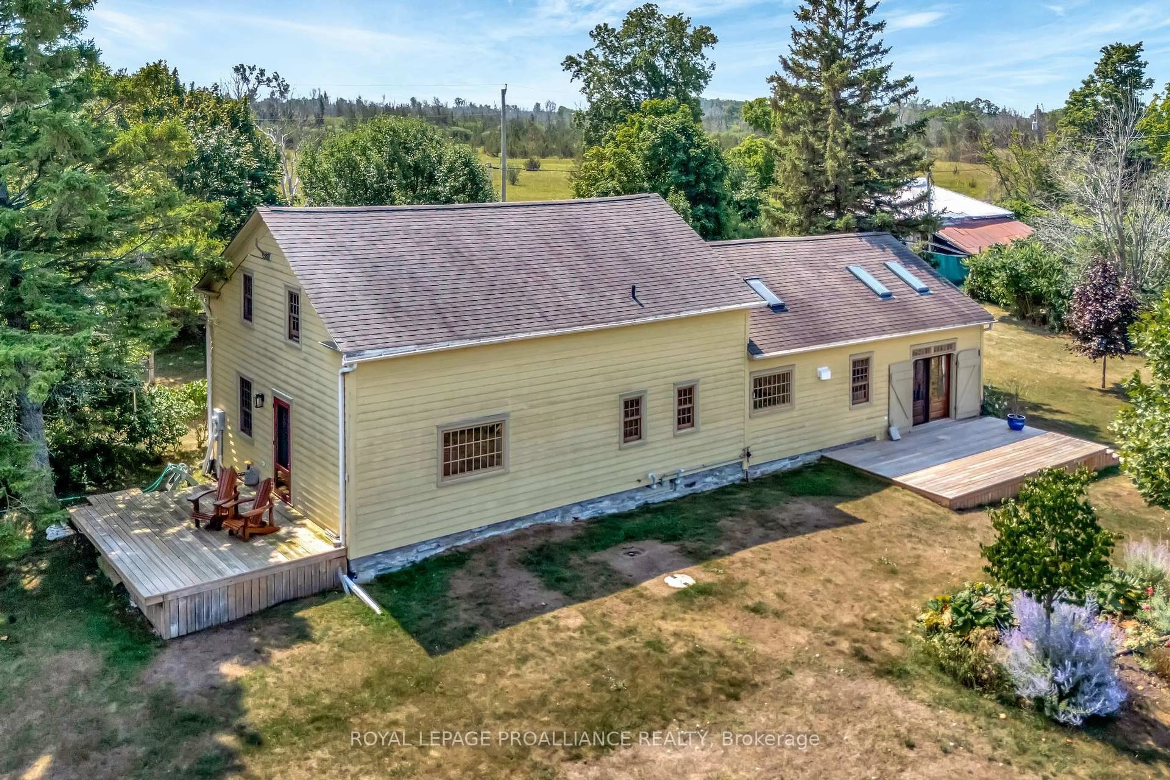 A pic from outside/outdoor area/front of a property/back of a property/a pic from drone, building for 406 Salmon Point Rd, Prince Edward County Ontario K0K 1P0