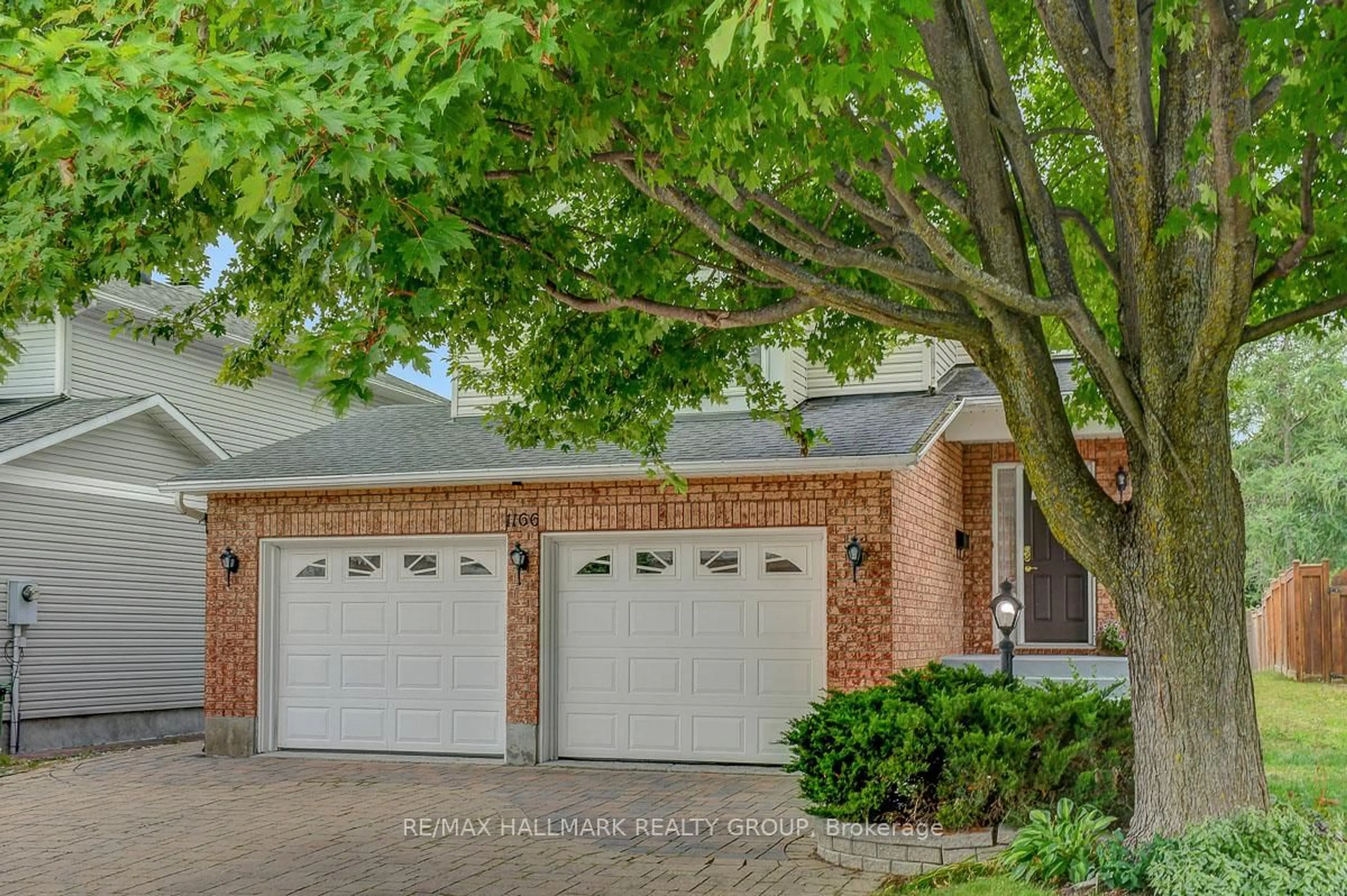 Home with brick exterior material, street for 1166 Ambercrest St, Ottawa Ontario K1J 1B2
