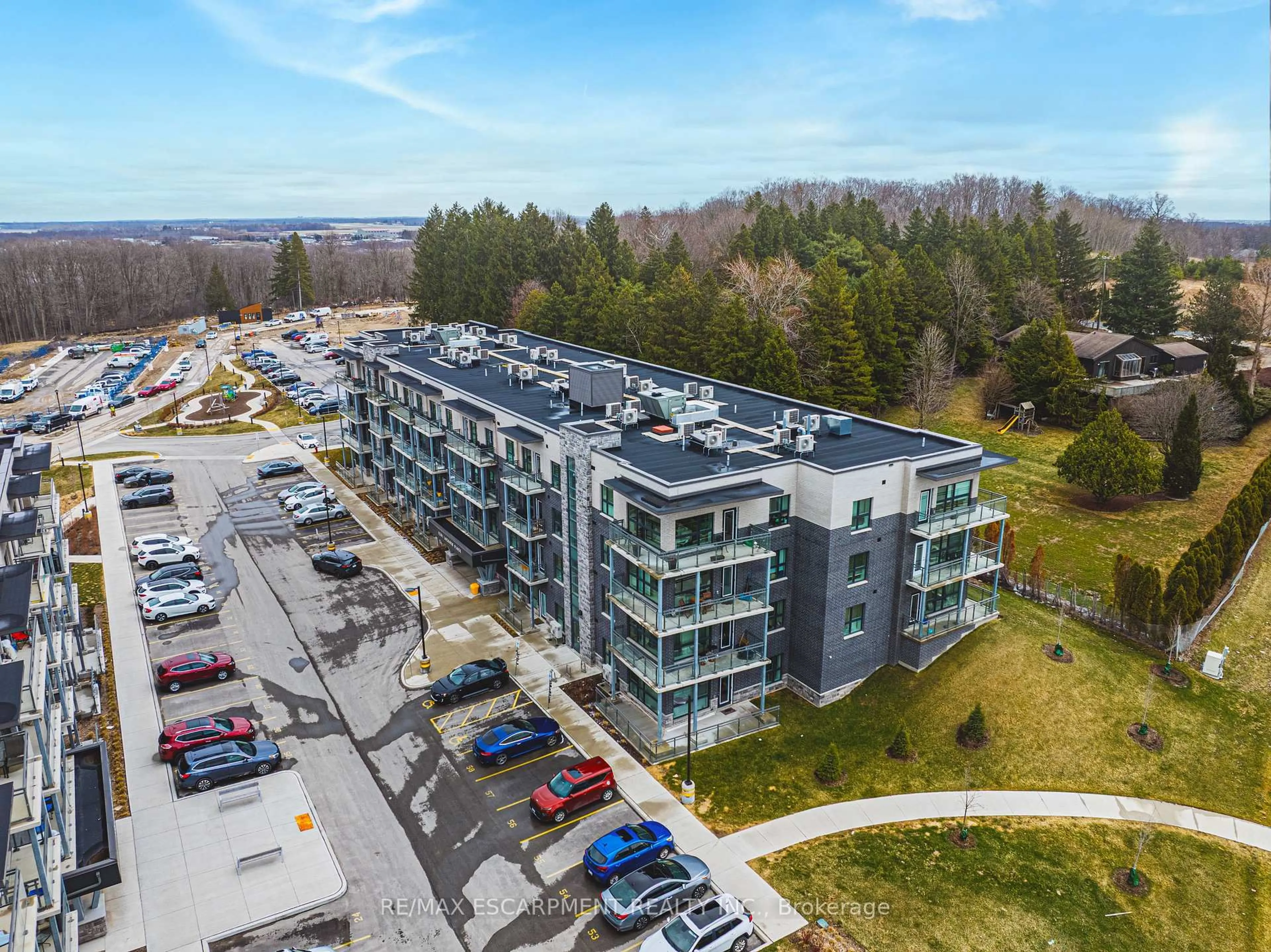 A pic from outside/outdoor area/front of a property/back of a property/a pic from drone, building for 1201 Lackner Pl #310, Kitchener Ontario N2A 0L4