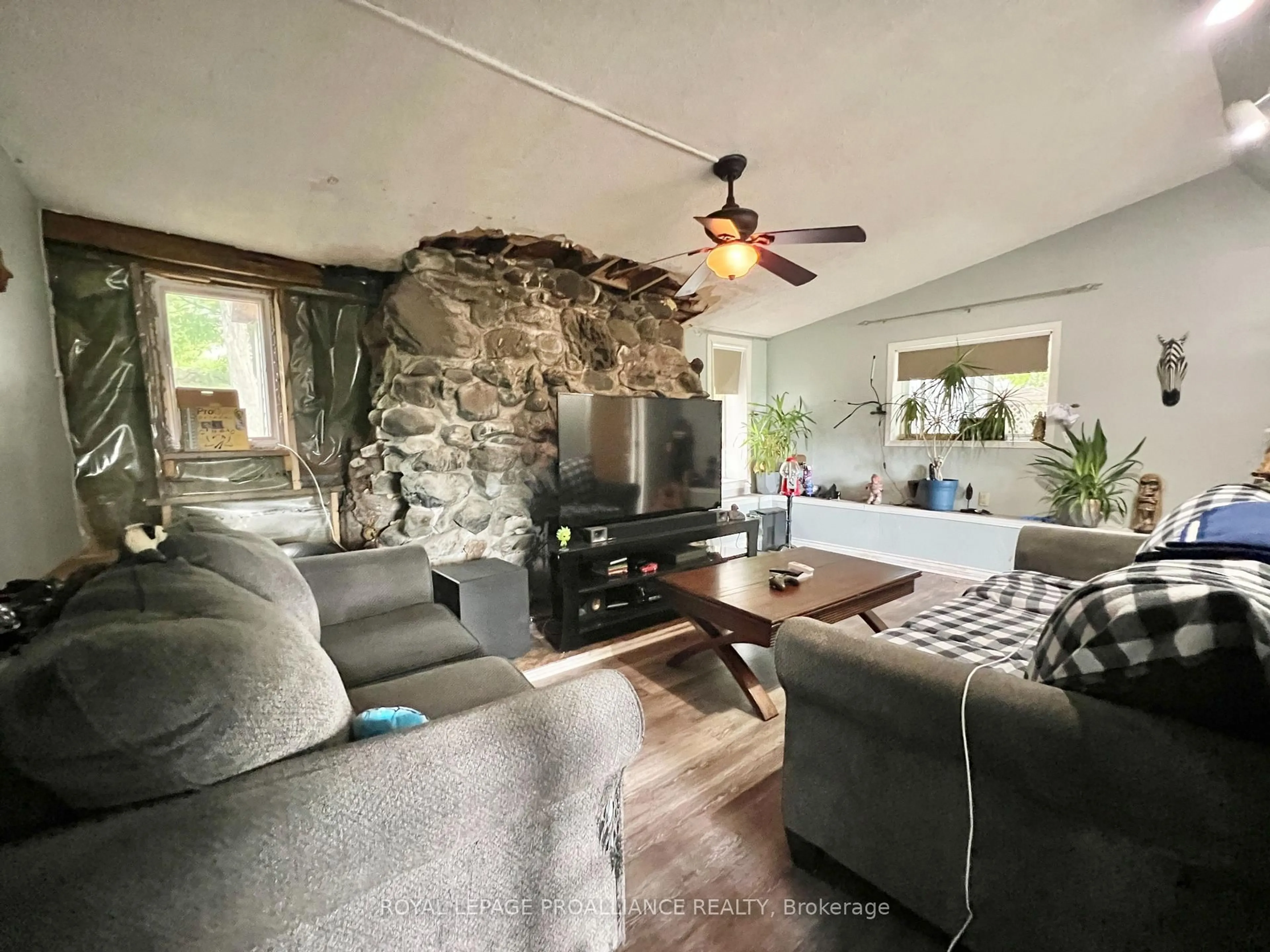 Living room with furniture, wood/laminate floor for 2112 Hamilton Rd, Trenton Ontario K8V 5P8