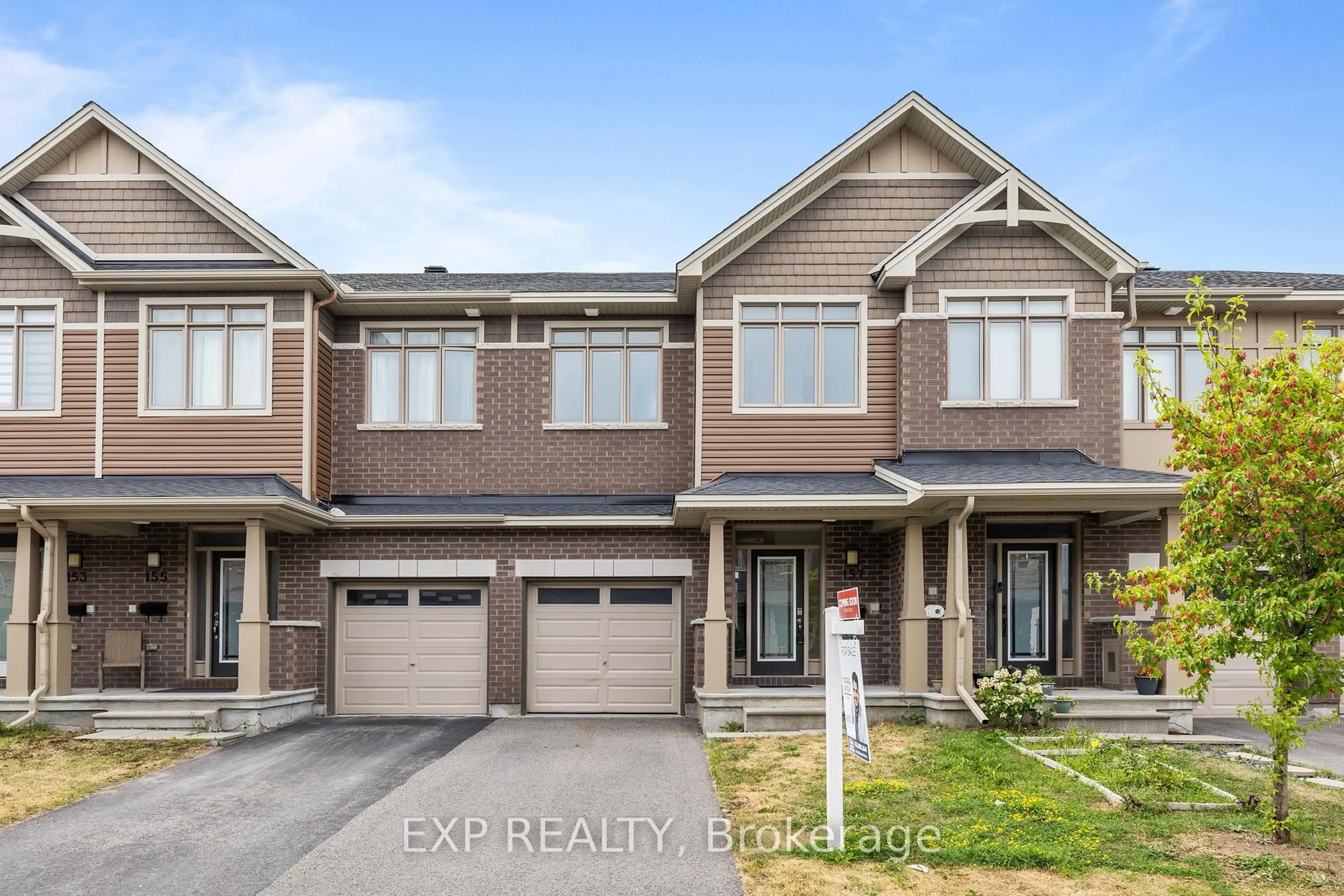 Home with brick exterior material, street for 157 Overberg Way, Ottawa Ontario K2S 0V8