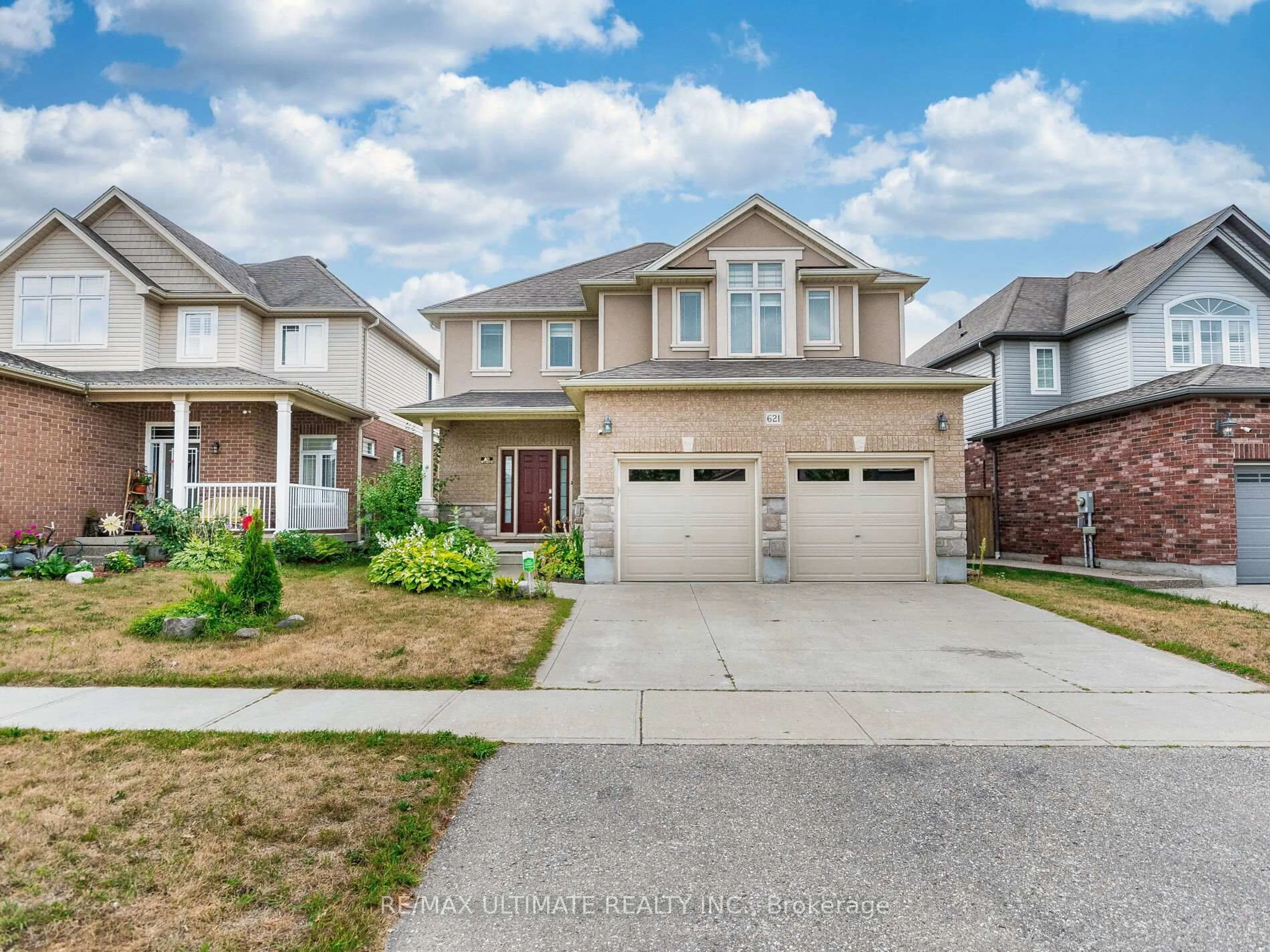 Home with brick exterior material, street for 621 Thomas Slee Dr, Kitchener Ontario N2P 2Y8